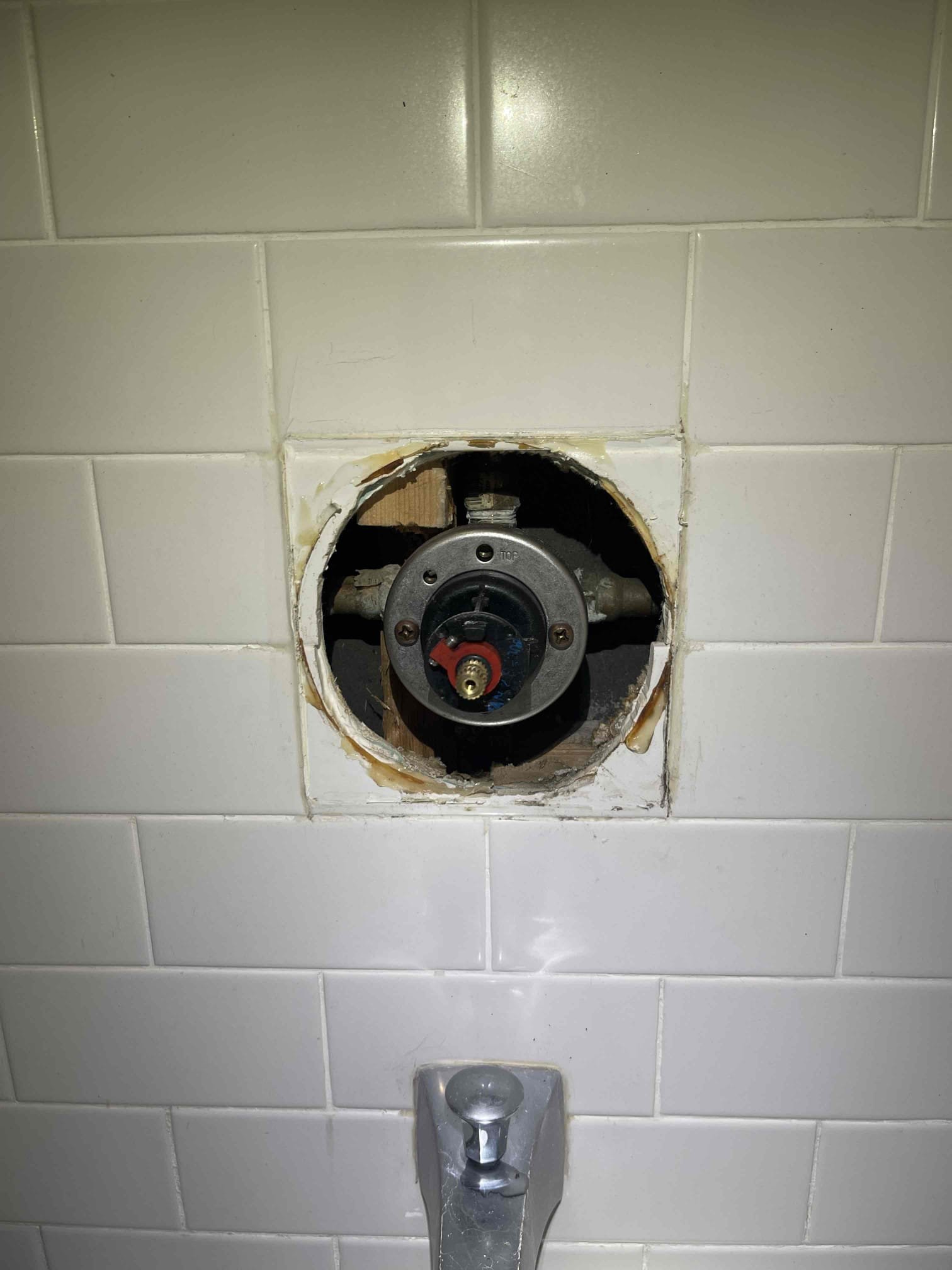 Customer had a shower valve running non stop in the upstairs guest bathroom. He also had a wet spot on the ceiling below the shower. We looked through the access panel and found no signs of the leak from the valve or the drain where visible. Water was spraying right underneath the glass through the caulking and running down to the floor. Believe this was the source of the leak. We replaced the shower cartridge and recaulked the shower at no charge. No warranty on the caulking. 1 year warranty on the shower cartridge. 
