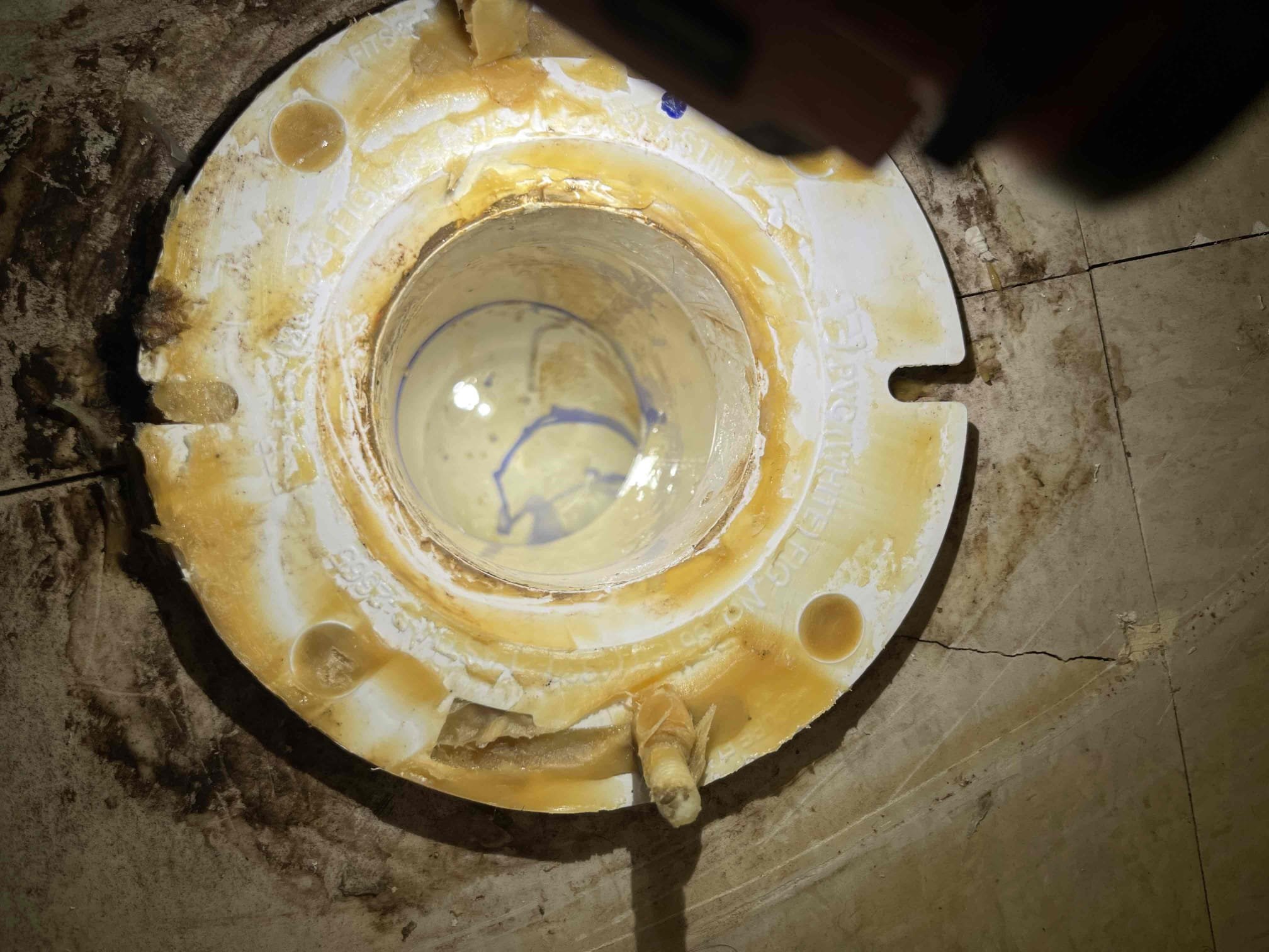 Came out for a back up occuring inside unit A6. This is not the first time we’ve been out to this location for a back up. Received approval from the tenants to pull the toilet and snake/camera the drain. Ran camera down and located the blockage in the same spot as last time. We ran the sewer snake down the line and cleared the blockage and got it to drain down. Re camera'd the drain and found there is a belly in the spot of the location of where the blockage formed that is in a junction between the two units. Sewer line will need to be dug up in this unit and the other unit to redo the junction and replace an additional 20’ down to the main line. The sewer line from the junction down to the 6” common main drain is back pitched/flat and will need to be replaced to restore proper pitch. Once we got the camera to drop down into the sewer main, we found it was also backed up and not draining. We located another blockage inside the mainline but can not see what it is due to all of the sewag