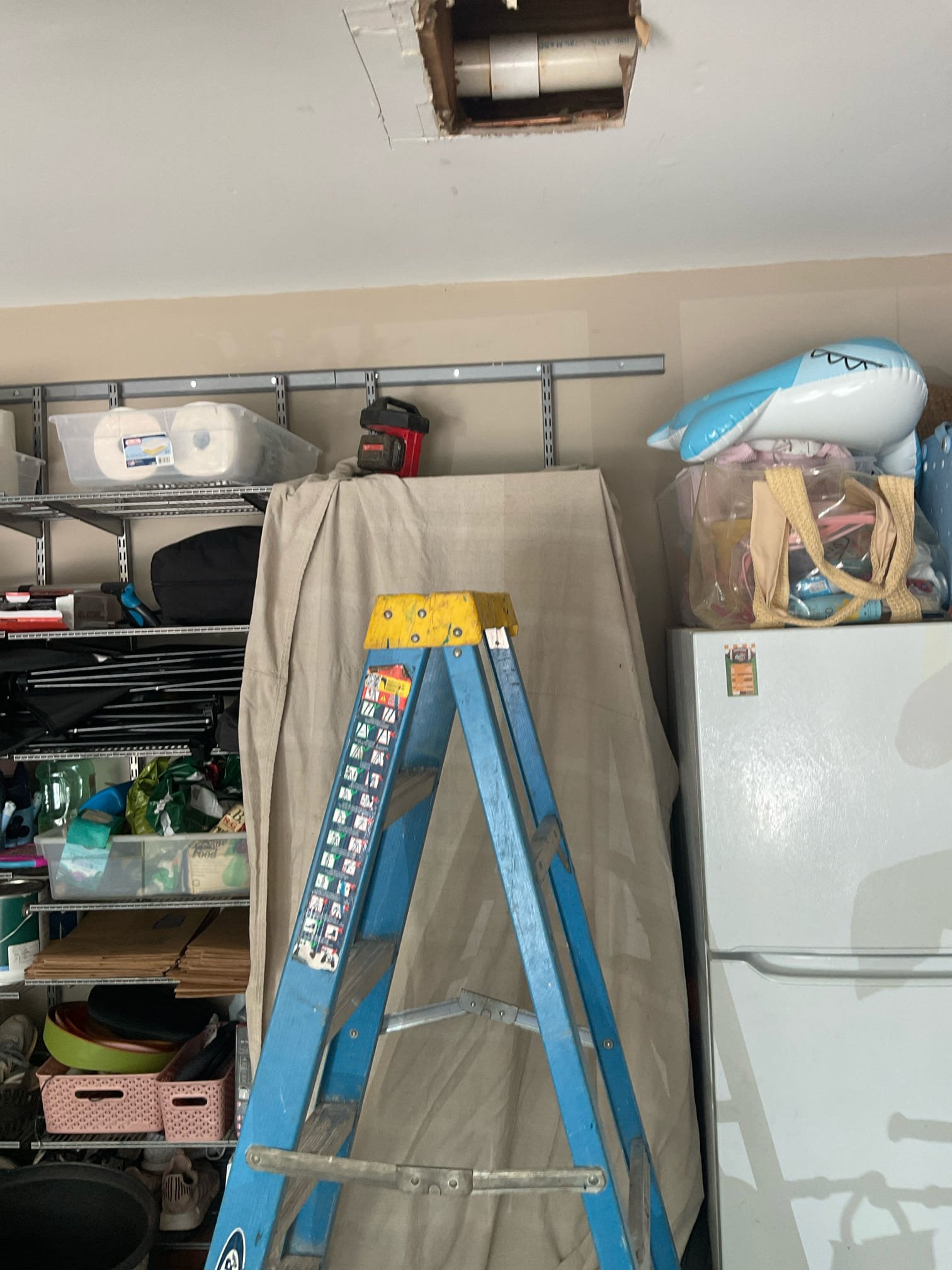 Open ceiling in garage , fixed a copper pinhole leak and fixed an additional area about to leak . 