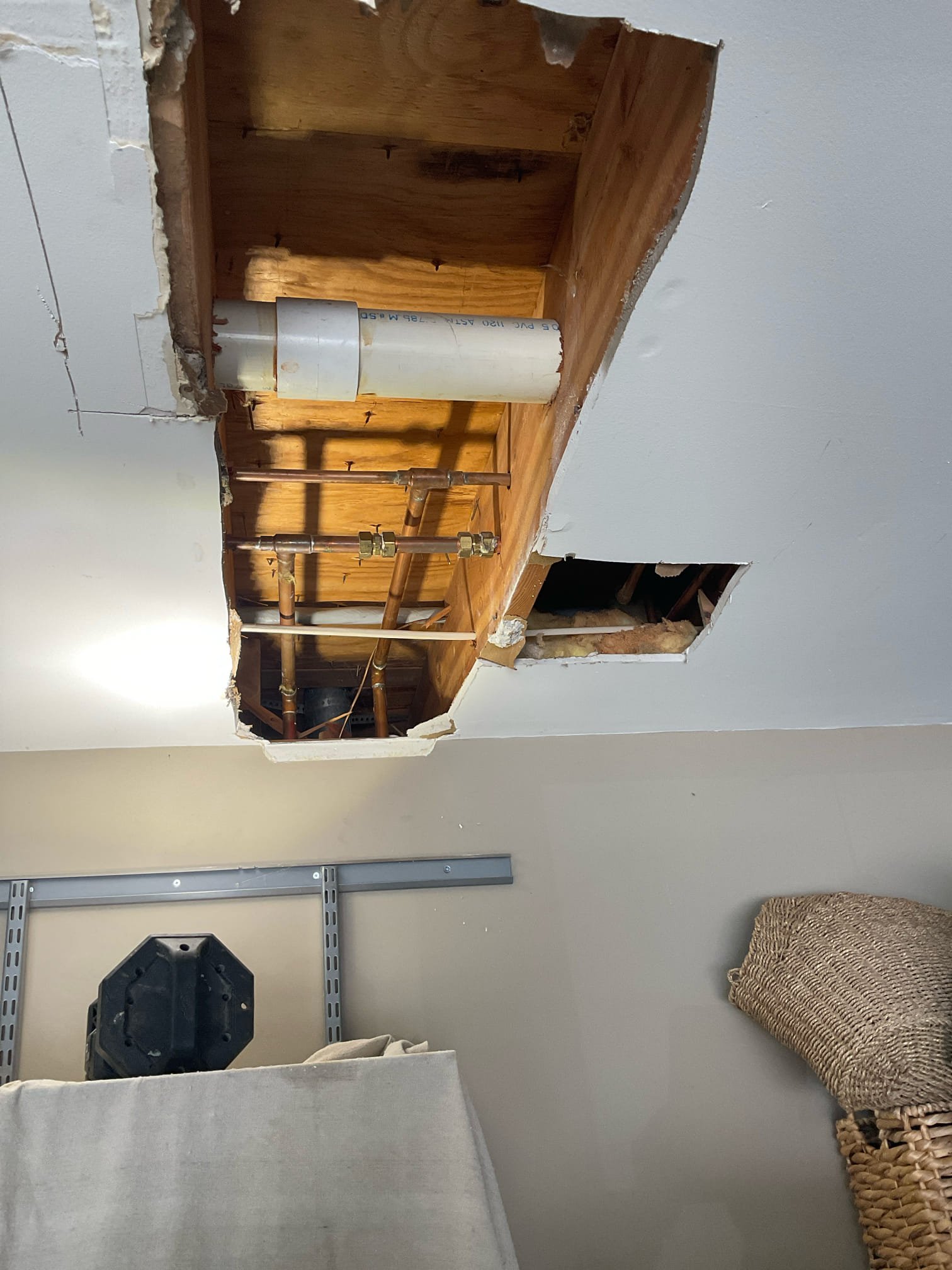 Open ceiling in garage , fixed a copper pinhole leak and fixed an additional area about to leak . 