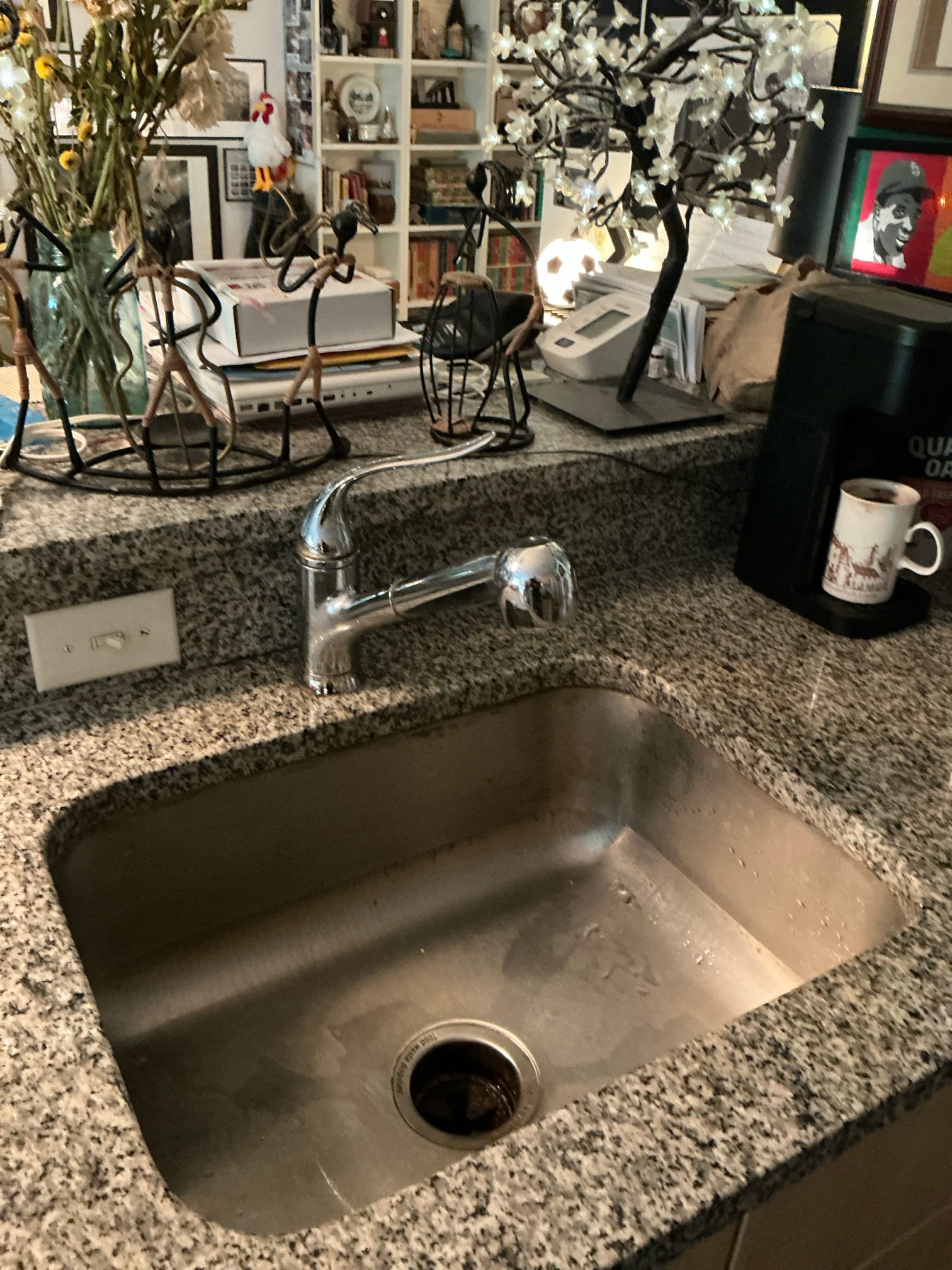 Kitchen faucet leaking from base. Customer provided new kitchen faucet. Installed customer supplied moen Riley 7402BL kitchen pull down faucet. Tested and left in good working order.