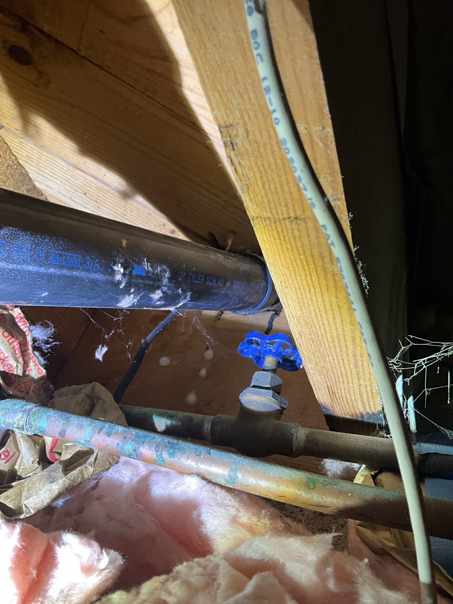 Customer had a leak between floors for a kitchen drain line on a common vent for the upstairs lavatory. Upon running water found that the ABS going through the floor was cracked on the tee and vertically on the pipe all the way to the next turn. Replaced the tee and the section of ABS through the floor with pvc. Tested all work to ensure proper function and no leaks. None were found additionally. 