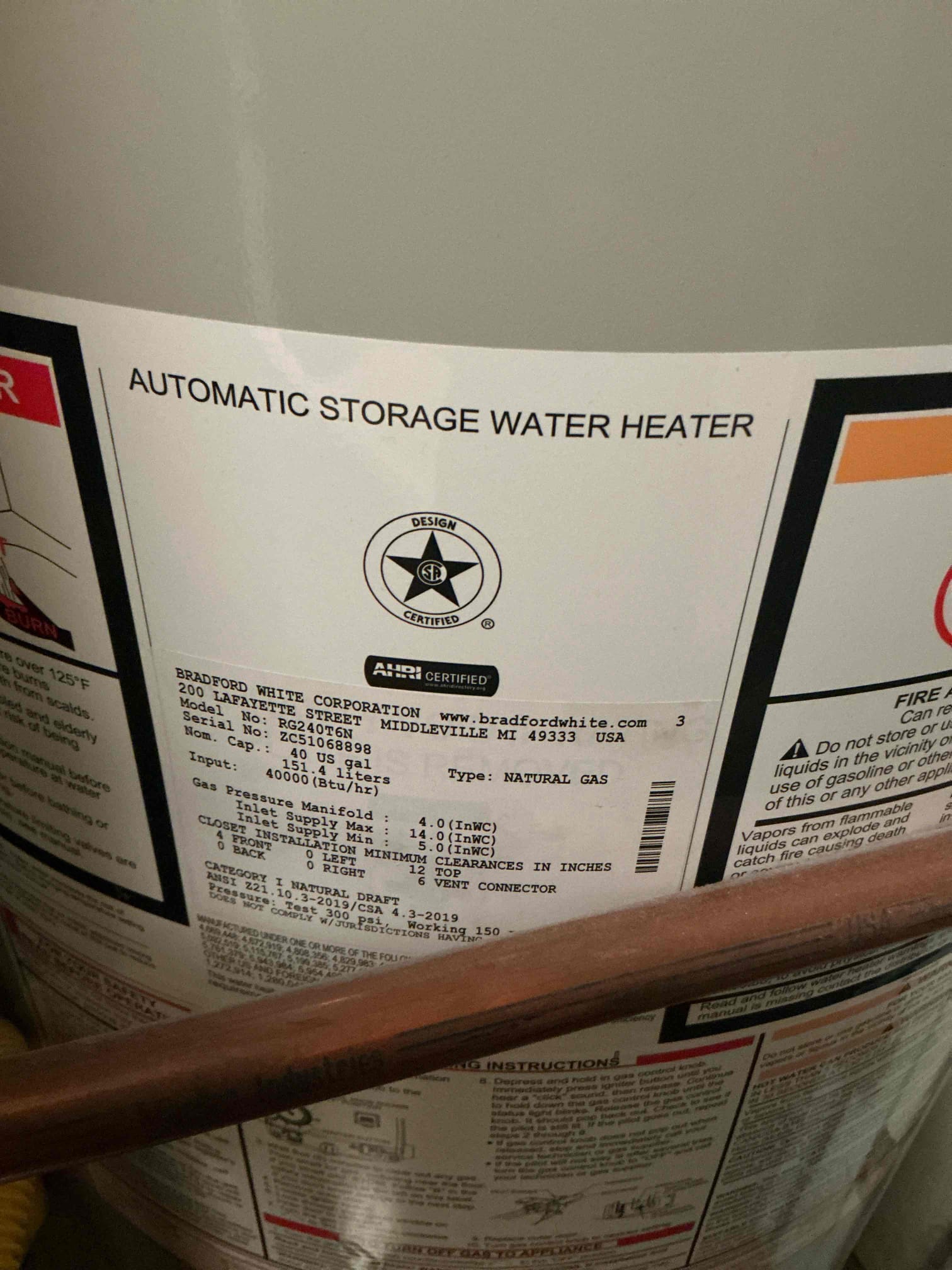 Diagnosed tub not draining in hallway bathroom. Ran snake and cleared stoppage. Thoroughly tested tub drain and is working properly. Also checked kitchen sink faucet handles. No issues found with faucet. 