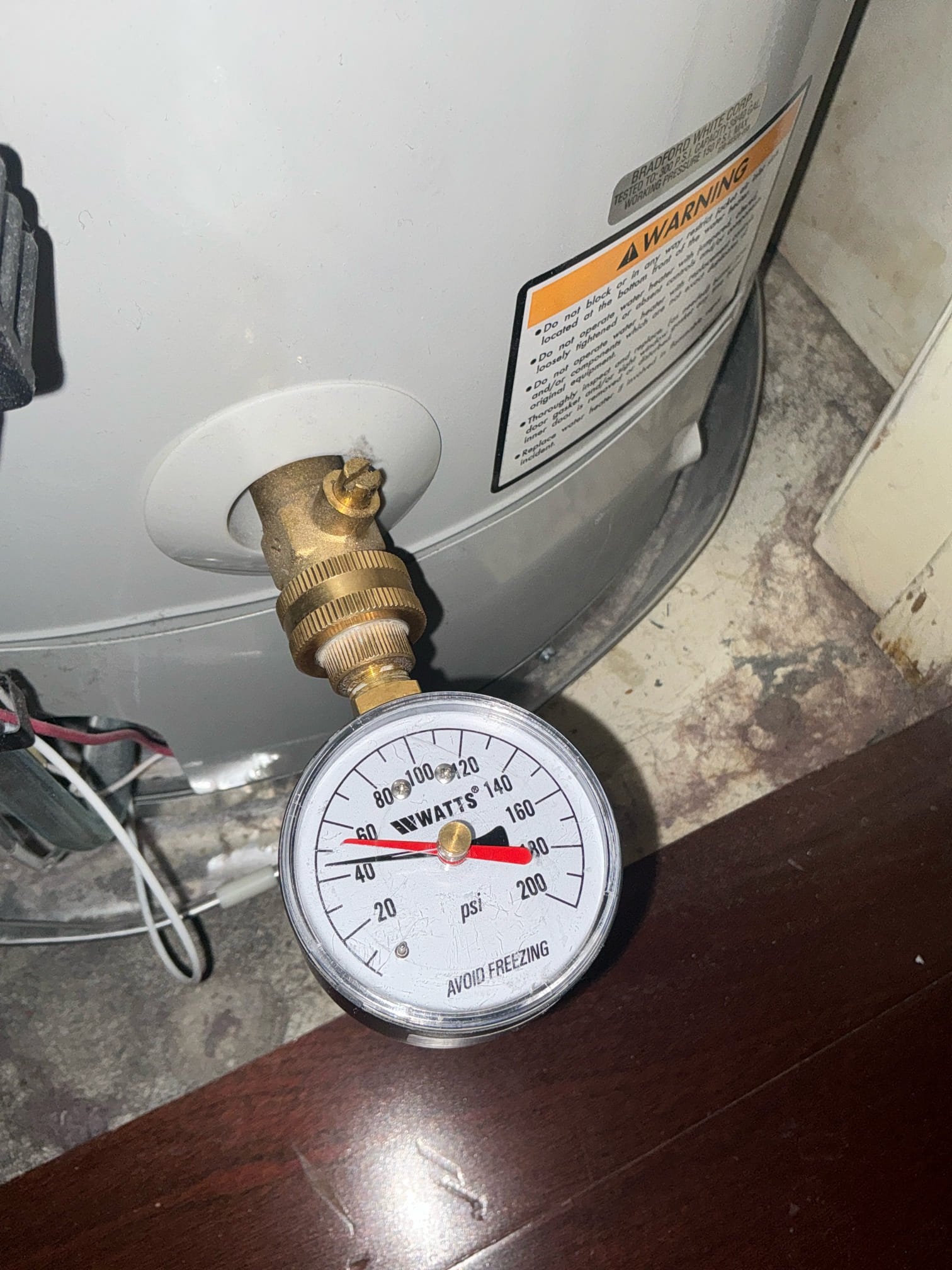 Diagnosed tub not draining in hallway bathroom. Ran snake and cleared stoppage. Thoroughly tested tub drain and is working properly. Also checked kitchen sink faucet handles. No issues found with faucet. 