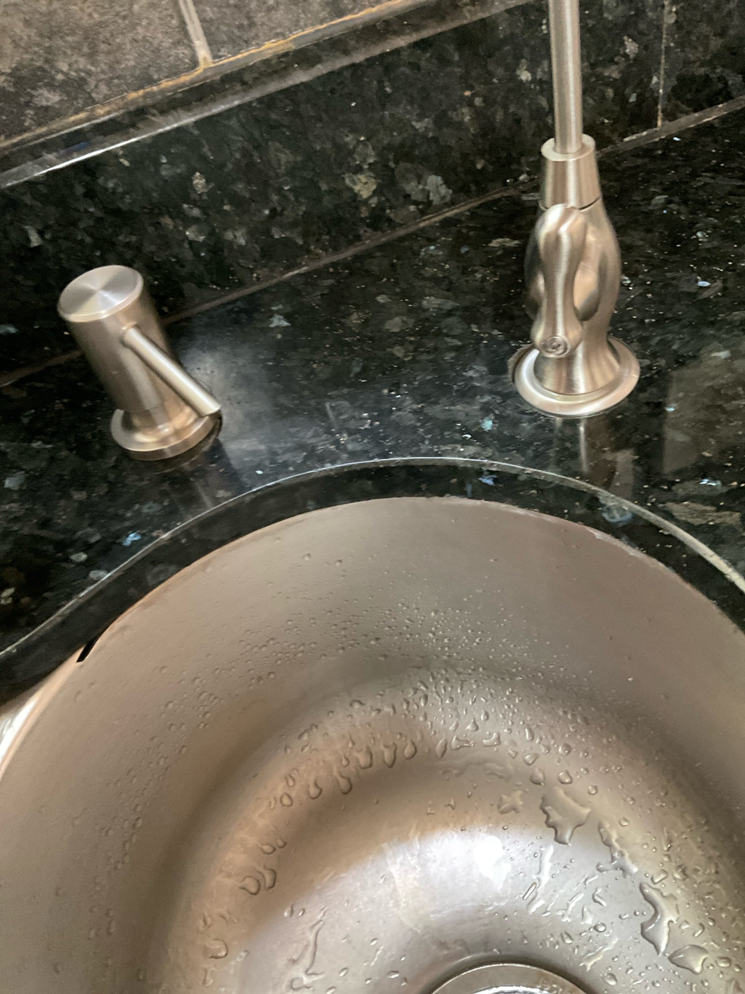 Customer called us out today because water heater was replaced a week ago and now sewer ejection pump is kicking on. Also, customer stated that nothing in the basement is used. Flush toilet and ran sink to get pumped to kick on and pump seemed like it was working as it should and didn’t notice any issues at this time. Ask customer how old pump is and customer is ensure but did say that a pump is close to 10 years old. Would recommend replacing to prevent future issue. Also, customer had me look at water heater to make sure everything was installed correctly and only thing cause for concern will be is thermal expansion tank isn’t strapped. Also, customer mentioned that there was a leak under the sink. Found that faucet and soap dispenser have gaps to where water can leak through it and leak down to the bottom of the cabinet. As far as plumbing under kitchen sink, there was no leaks. Will send estimates for recommended repairs