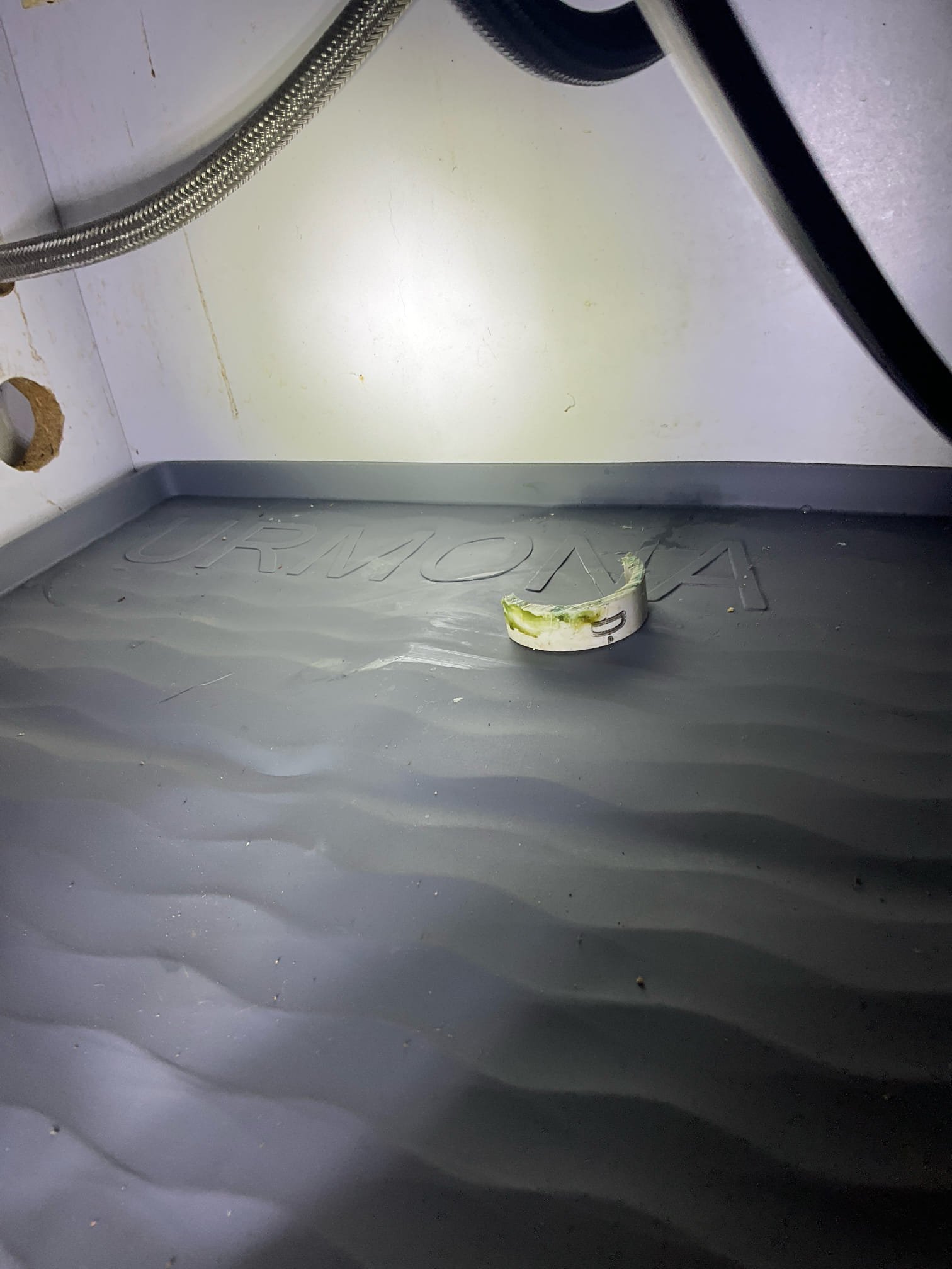 Fixed a small leak under the sink from soap dispenser area , removed a spacer and tightened nut with some clear caulk under the soap dispenser flange , warranty work , no charge 