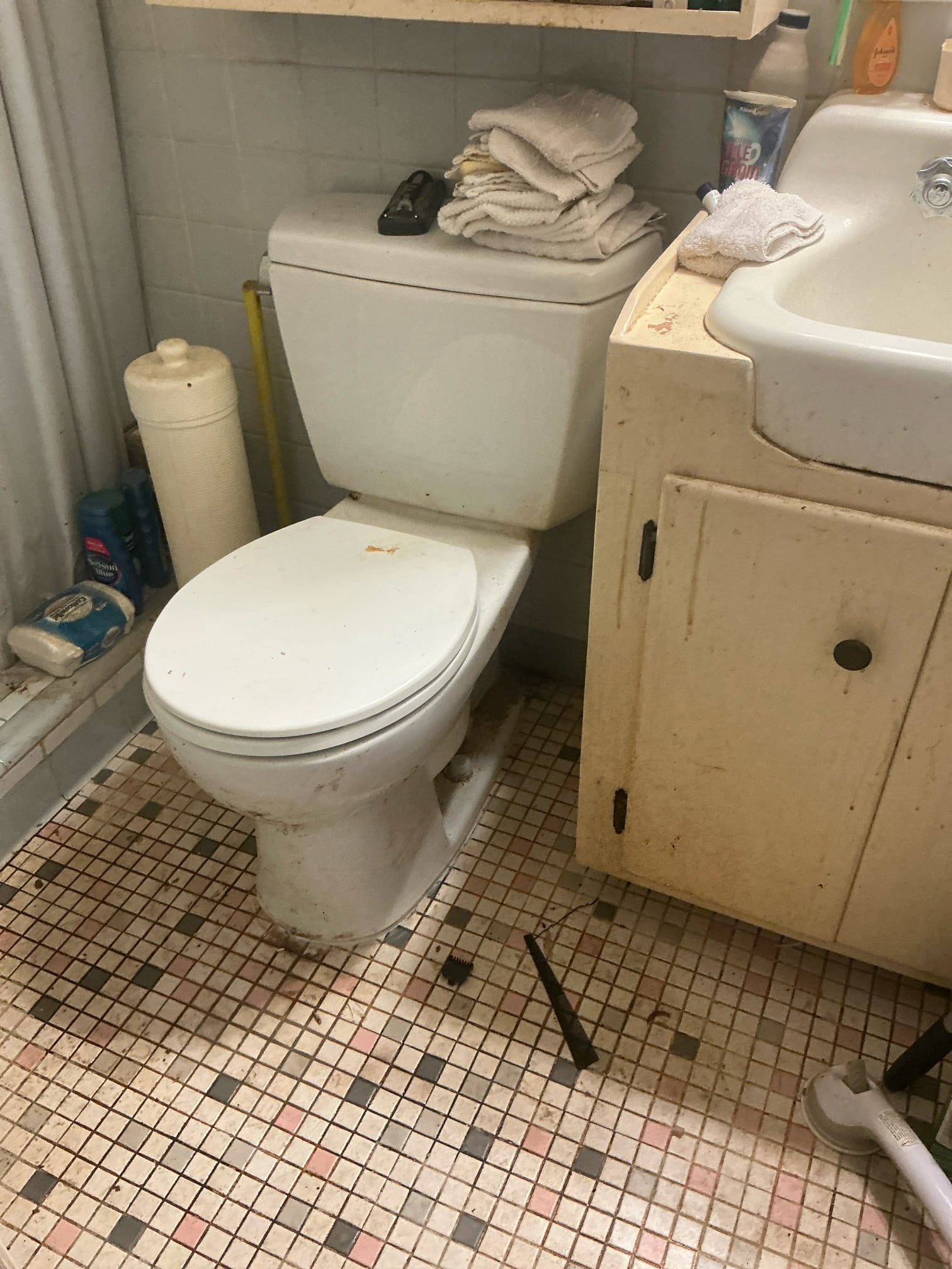 Pulled back bedroom toilet. Checked toilet and flange. Reset toilet with new wax seal. Snaked kitchen sink to clear blockage. Did not pull anything back. Tested and left in good working order.