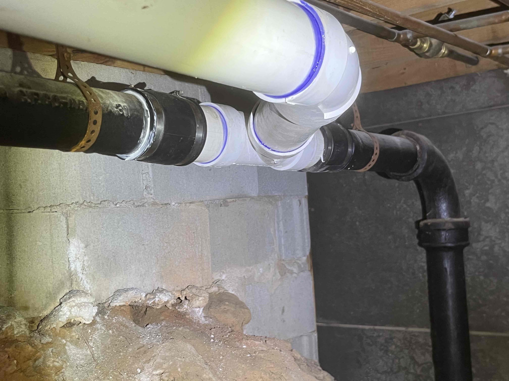 Customer needed water lines and drain line run to new fixture in kitchen with a customer supplied water filter install. Description of work as sold below:

“Price is to cap two uncapped 2 inch cast lines below the floor. Run a new drain line from 3 inch cast in 3 inch pvc and run new pvc line through the floor. Run hot and cold pex lines through the floor under cabinet with two stops and connect customer supplied under sink filtration (No warranty on customer supplied parts). Customer is having an hvac line removed, will need the line removed and capped prior to work being done.”

Tested all work to ensure proper function and no leaks. No leaks were found on our work, but a leak was discovered in the body of customers faucet. Made customer aware. Left customer price for a tankless install due to age of water heater and the heater needs to be moved due to a porch being built. 