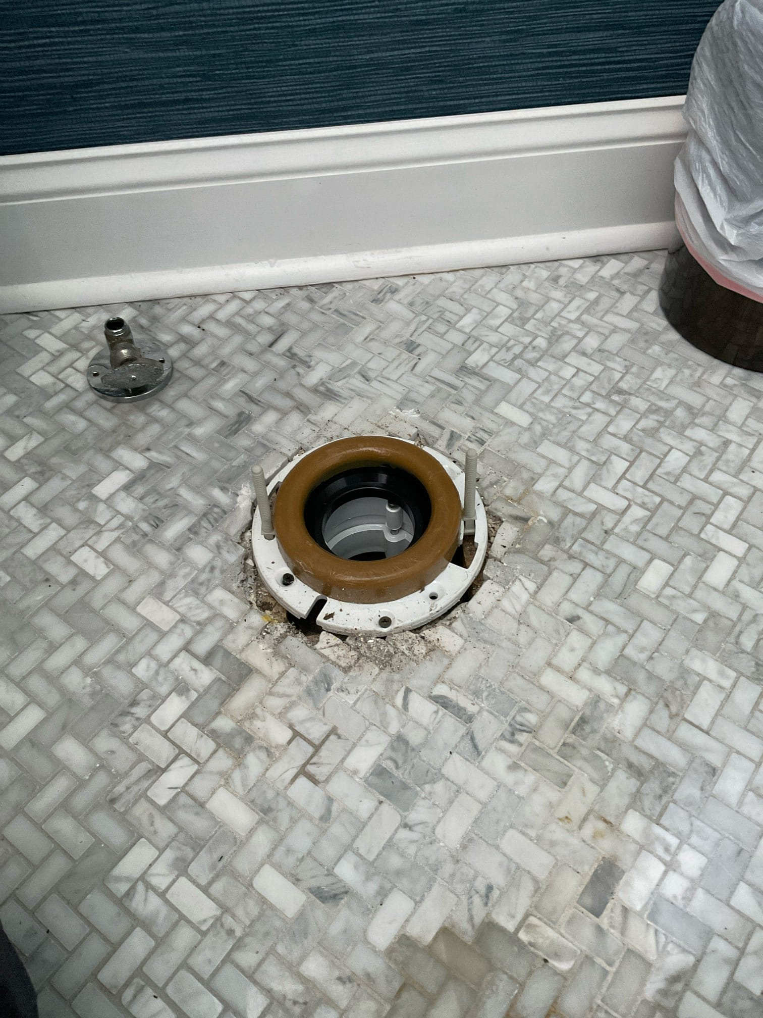 Pull toilet and run camera to inspect sewer/drain line.

Pulled toilet on main floor and ran camera to inspect drain/sewer line. Was only able to get out about 90 feet. Drain line/sewer line goes from cast-iron to concrete. Cast-iron and concrete are not in the worst condition but also not in the best condition. Both pipes have wear on them and in the future will need to be replaced. Inspected flange and found that it was broken. Replaced flange and reset toilet. Tested and no leaks were present at this time. Caulked around base of toilet and cleaned up work area.