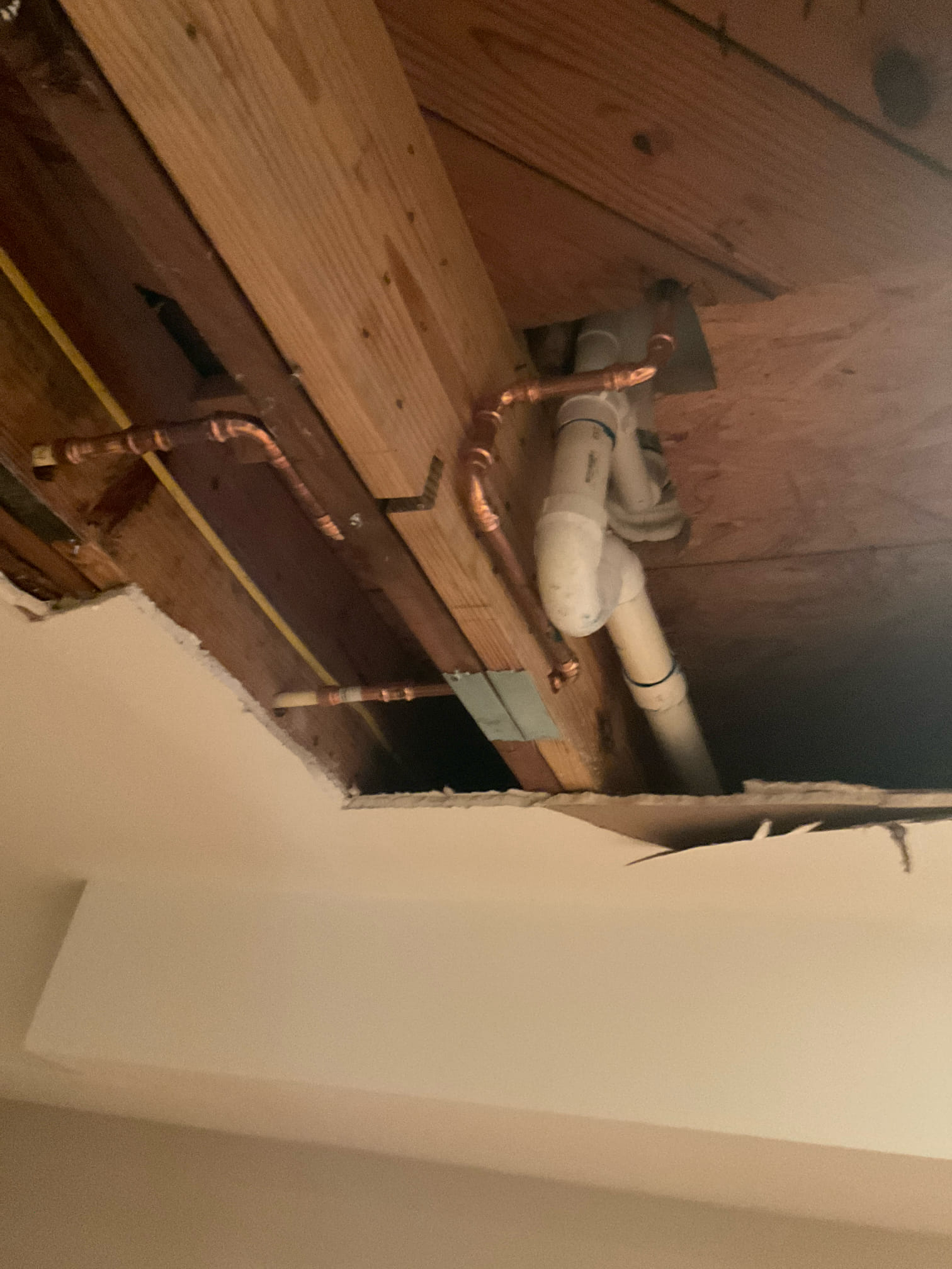 Opened ceiling, replaced tub waste overflow assembly, add p trap and some water line pipe replaced 