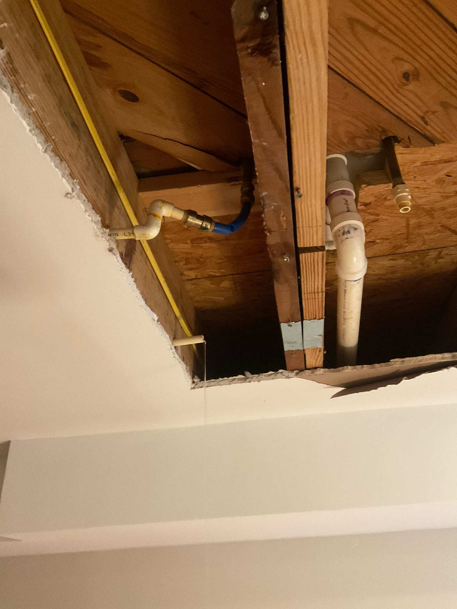 Opened ceiling, replaced tub waste overflow assembly, add p trap and some water line pipe replaced 