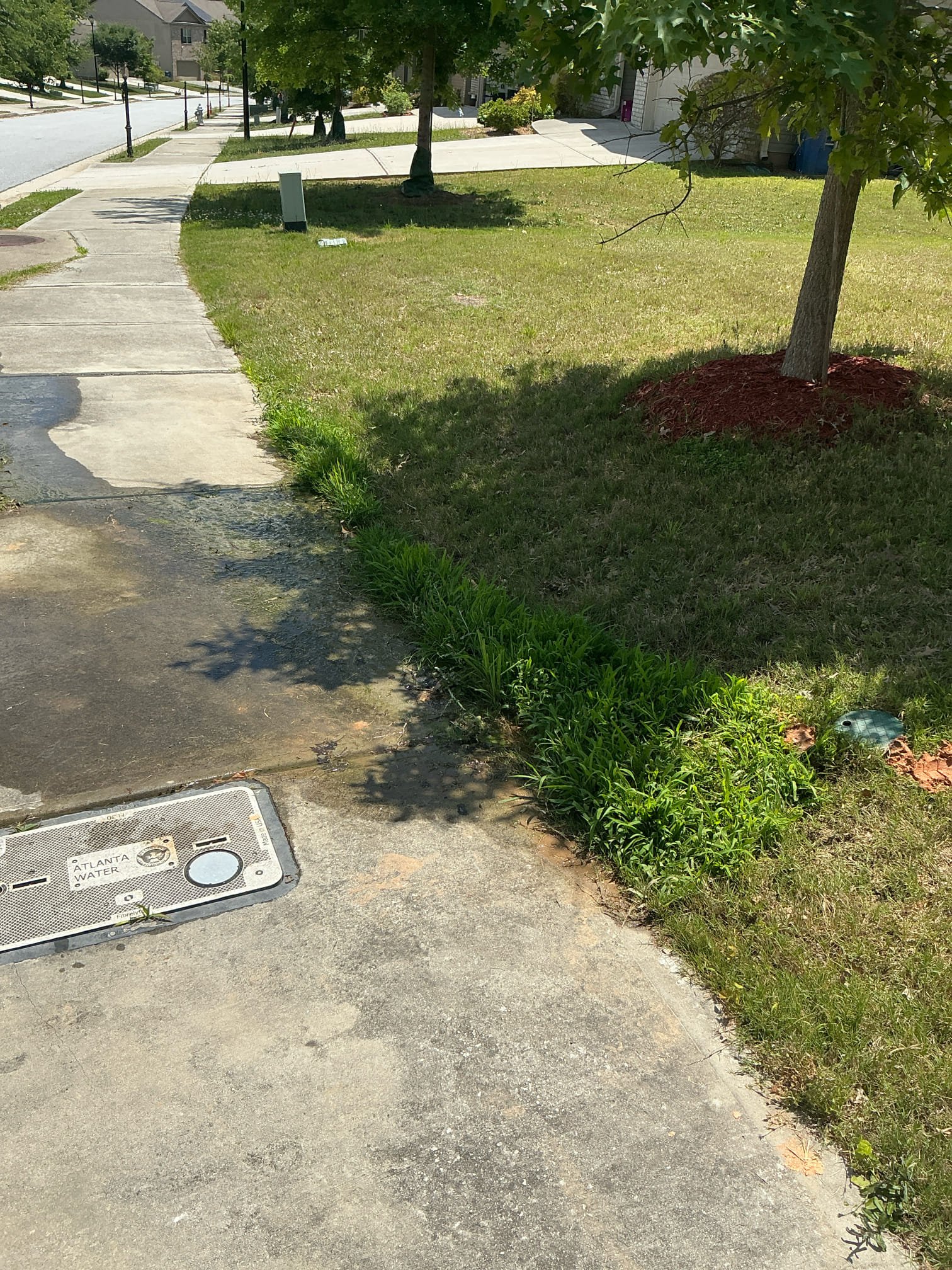 Water coming up at side walk between meter that is in sidewalk and service customer shut off in grass. Customer does not want to proceed at this time.