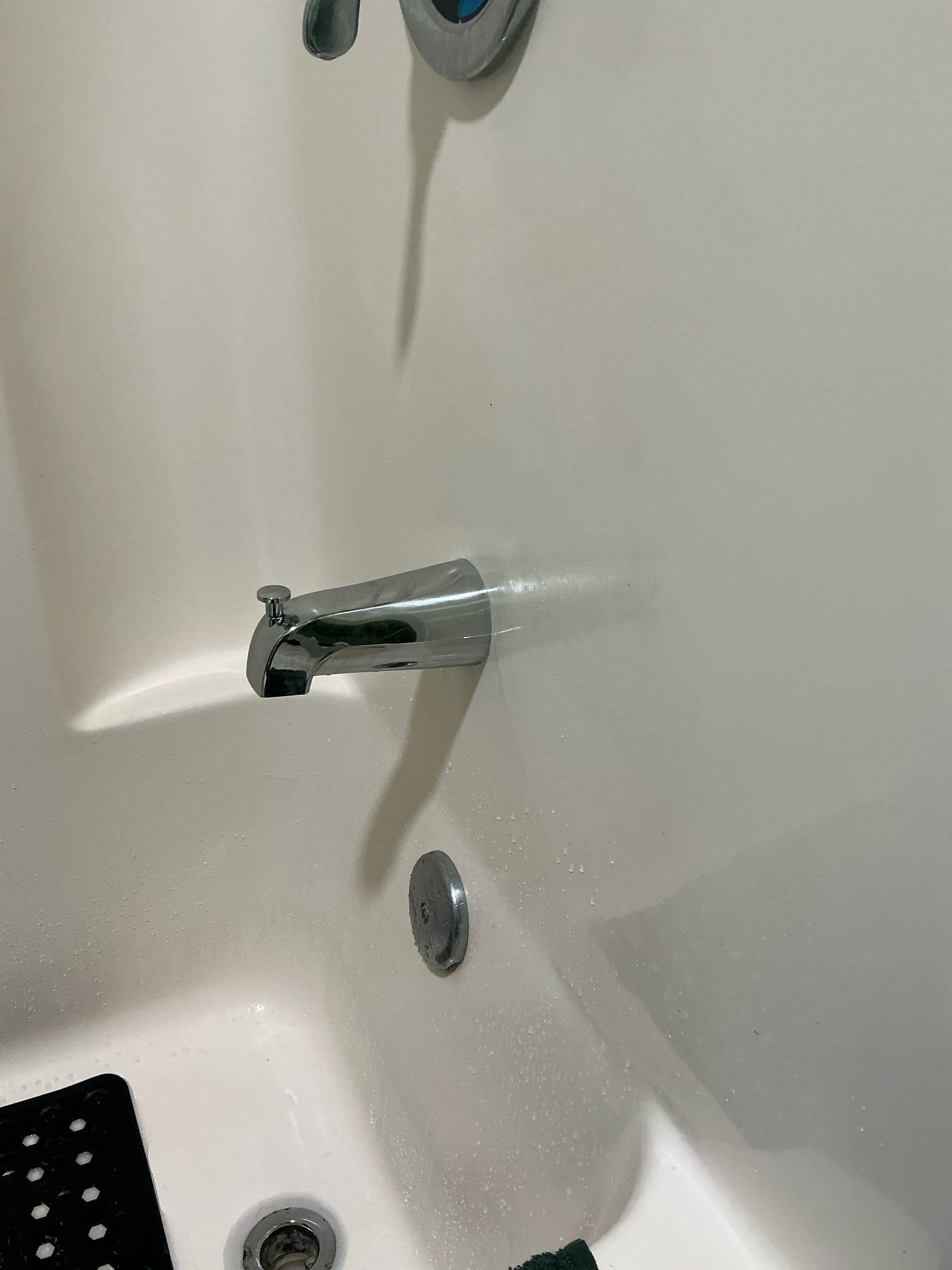 Old spout removed on arrival. Installed customer supplied spout in upstairs guest restroom tub. Tested and left in working order. Found water in water heater pan and water heater is from 2007. Estimate given for replacement.