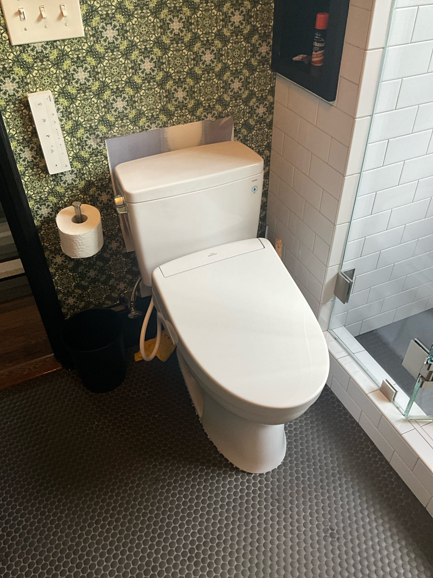 Installed customer supplied Toto Drake toilet with new bidet in upstairs bathroom. Installed the remote in a vertical position since the bracket was already there from the previous position. Showed customer and customer preferred a horizontal orientation. Set to customer request. Tested all work to ensure proper function and no leaks. None were found.