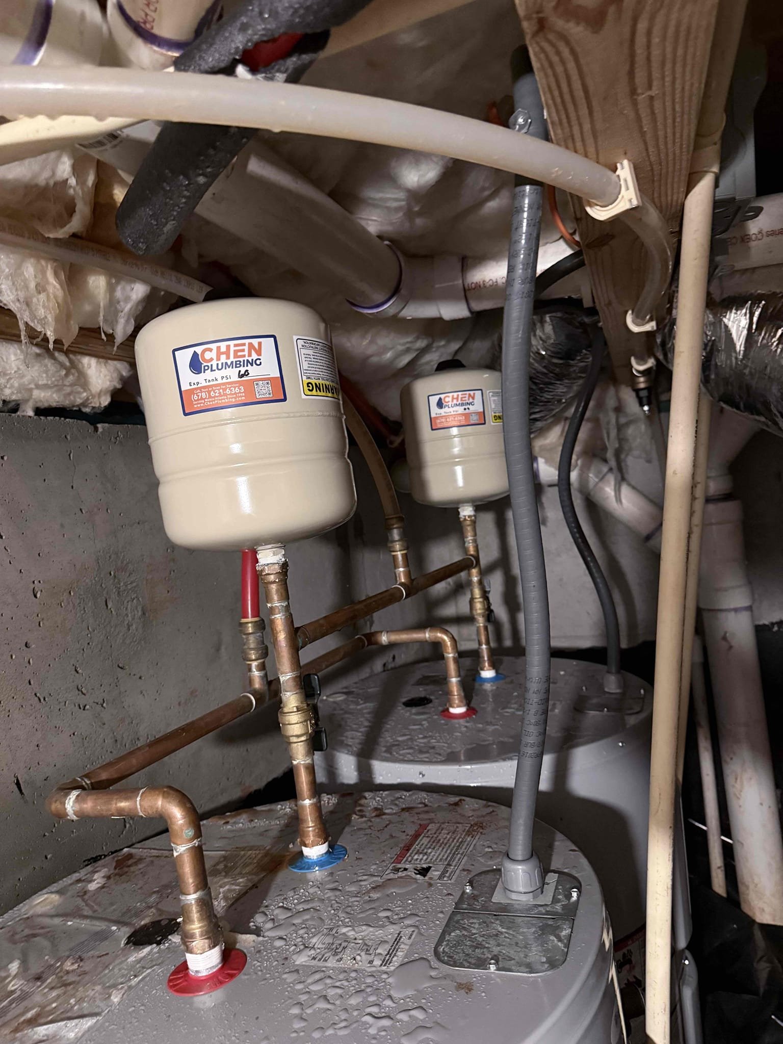 Expansion tank suddenly ruptured causing water damage upon arrival. Customer stated this morning they heard water and found out the expansion tank had busted. Informed customer with them have two water heaters it would be best to have 2 2.5 gal expansion tanks to support both tanks. Gave customer estimate, customer approved estimate. Installed 2 new expansion tanks one on each water heater. Recommend customer start thinking about replacing PRV due to it being a shark bite PRV, but at this time it was working properly. Augered master bath toilet as a courtesy due to it flushing slowly. Water is turned back on and everything is working properly. No leaks upon departure. Provision will be in contact. 