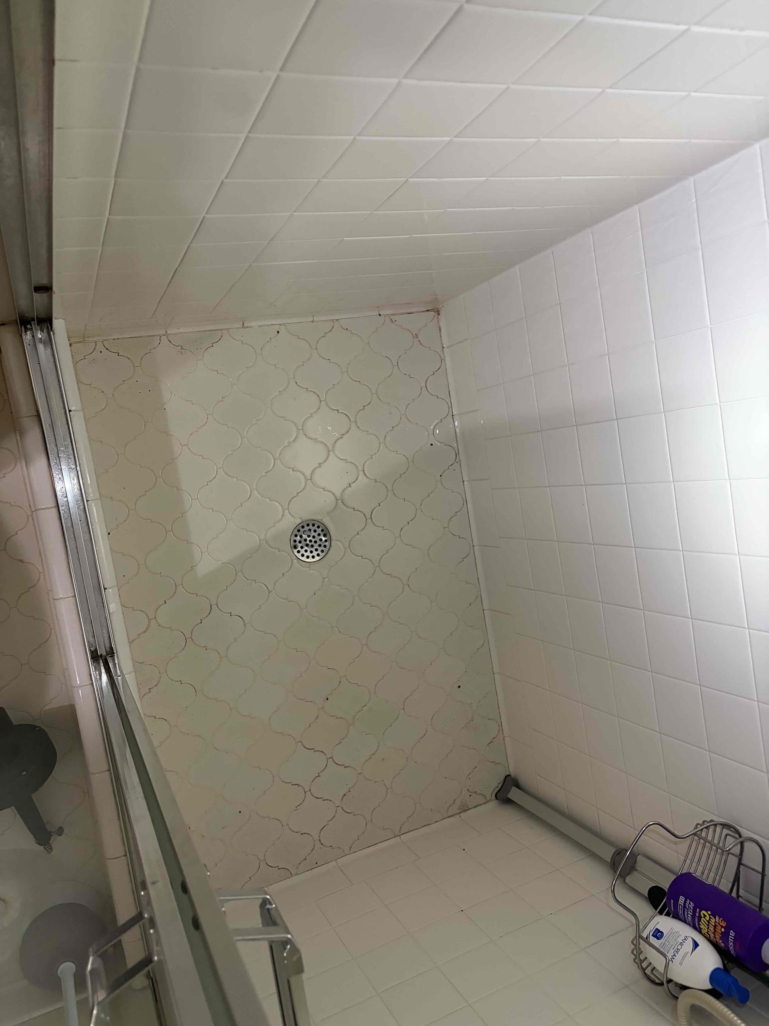 For this customer, the main complaint was the shower drain in the basement was clogged anytime that you’d run water. It would just back up so therefore, I took a look at it rent some water to see what would happen and yes, it backed up the customer had tried to use their snake, Little household one from the hardware store. I knew that one wasn’t gonna work so I recommended that we use a foot shaft to clean and clear that pipe the pipes underneath. The ground are all cast-iron from what I can see majority of the house has been re-piped and PVC, but the basement drain lines are all cast-iron. Additionally, we were able to snake it with the flex shaft and clean and clear everything that was inside of it. The black sludge that came out of it is just part of the age of the pipe and the buildup that it creates over the time the red snake in the photo has chains on the end of it, which is able to grab and pull whatever the issue is, I was able to clean and clear the piping thoroughly with the