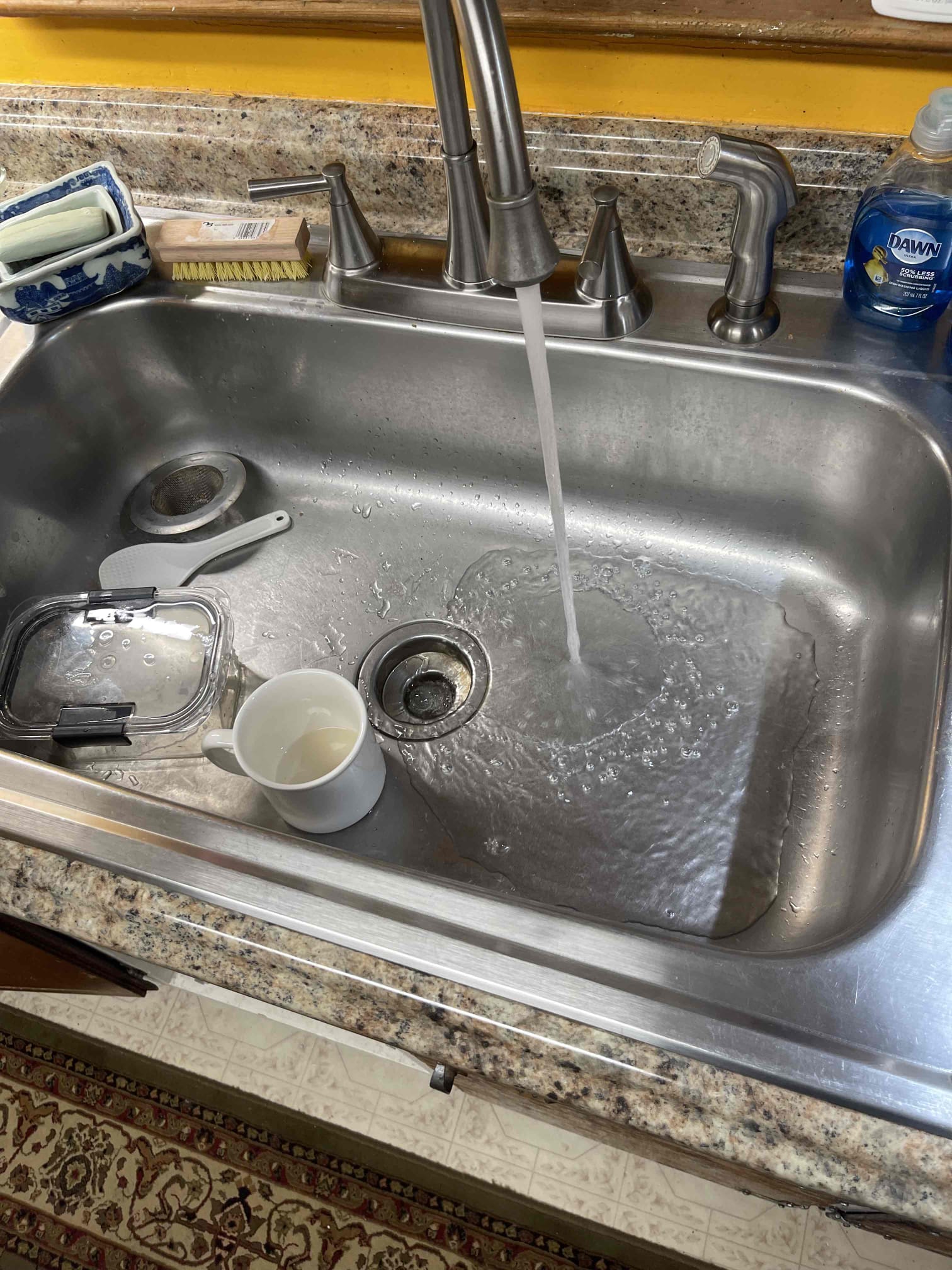Came out for sink gurgling. We had repiped the kitchen sink and drain line previously. Customer said it was working for awhile then randomly started gurgling. We confirmed that when water was ran in the kitchen sink for awhile it would start to gurgle. We removed the AAV and this corrected the issue. We cut out the old AAV and installed a new one and the issue was corrected. No further issue at this time. 