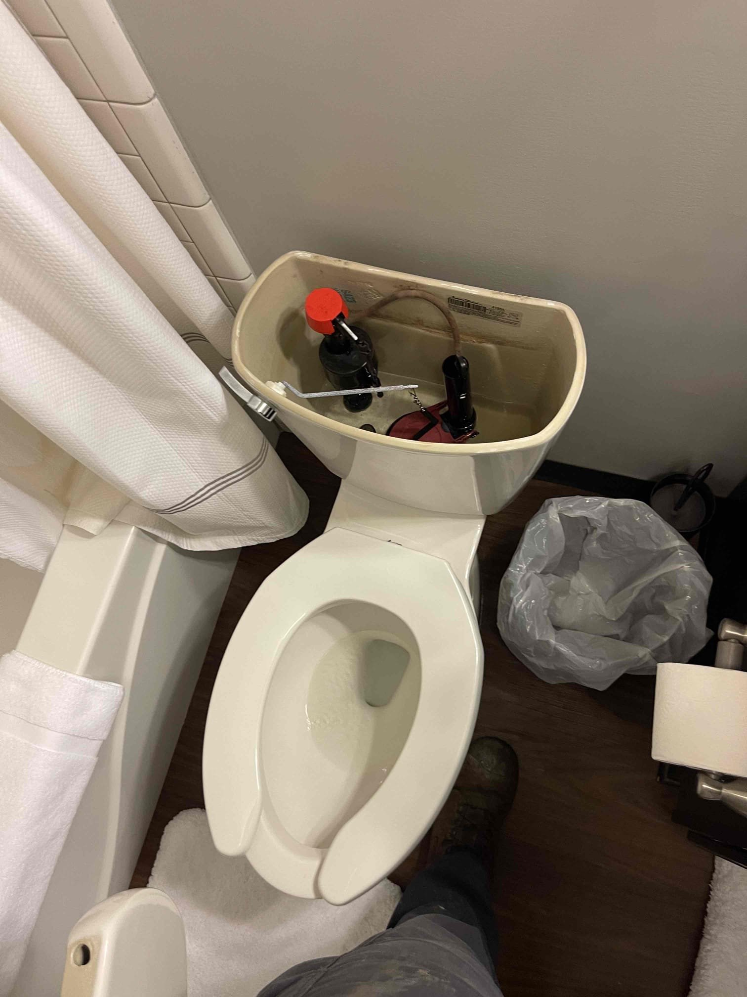 Came out for a possible clogged toilet. Arrived and went to the Perot building where I met maintenance staff. He directed me to the 4th floor for units 404, 407, and 408. They stated that no one has been in these units in months, and they had just come up here to make sure everything was working because they’re having guests come soon. We flushed every toilet multiple times and found no issues. Water was coming out discolored from the tank due to sitting stagnant for months and there was some air trapped in the water supply system that was kicking up sediment. Every toilet flushing with no issues. Examined the tank of every toilet on the 4th floor. Every toilet is almost brand new in appearance. We gave quote to pull a toilet and camera the line to ensure no other issues but maintenance elected to hold off at this time as everything was flushing normally. No further issue at this time. 