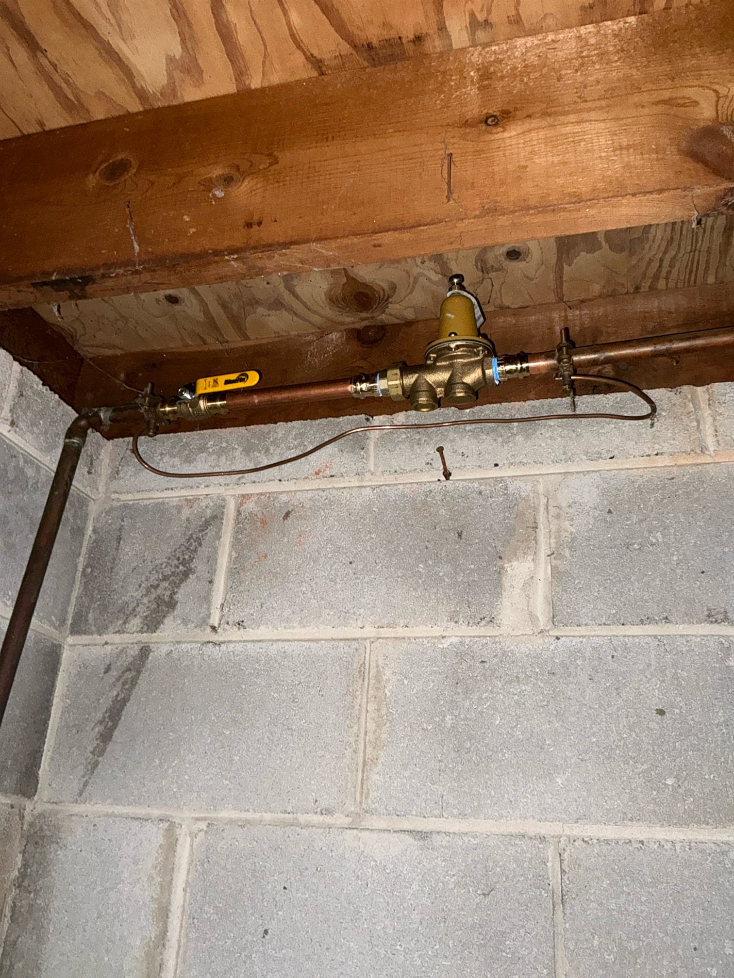 Shut off water to home and drain system. Cut out and replace old pressure regulator and shut off valve. Install new pressure regulator valve and new shut off valve. Set pressure to 65psi.
Replace leaking kitchen faucet with customer supplied faucet. Test for proper operation. Clean work space 