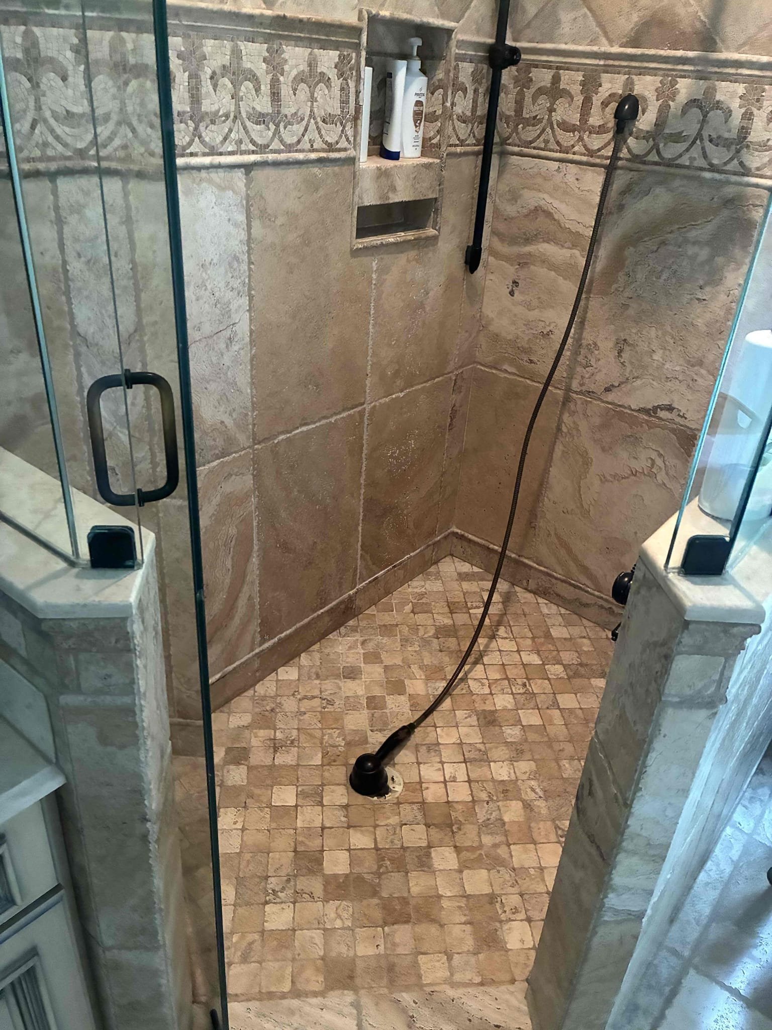 Customer had leak coming from ceiling with master bath shower above. After throrough evaluation found pressure to be good also informed customer about tankless flush maintenance. Gave options for repairs/maintenance. Cut ceiling and ran water through drain then preformed shower pan test by plugging drain allowing water to fill pan. Leak formed in ceiling coming directly from subfloor. Explained to customer about shower pan conditions and no put back of sheet rock. Cleaned area after work was completed 