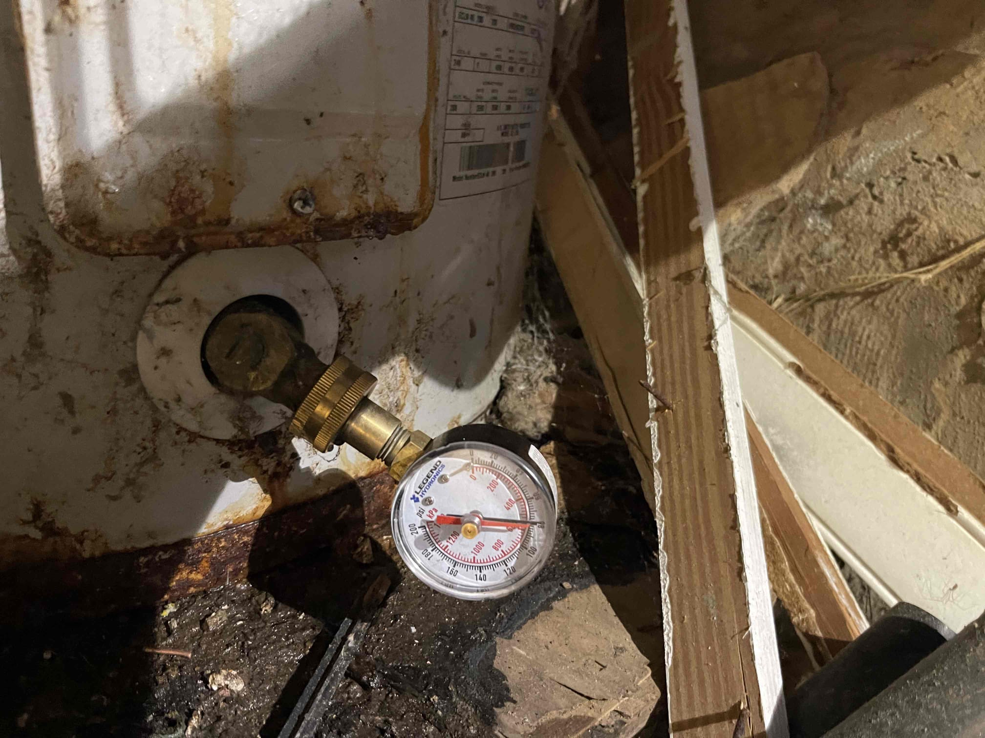 Left quote to replace a 40 gallon electric lowboy in the crawlspace. Replacement is going to require cutting out the framing for the door to the crawlspace to make enough room to get the old tank out and the new tank in. Customer getting multiple quotes at this time before making a decision. Water pressure tested in the normal range. 