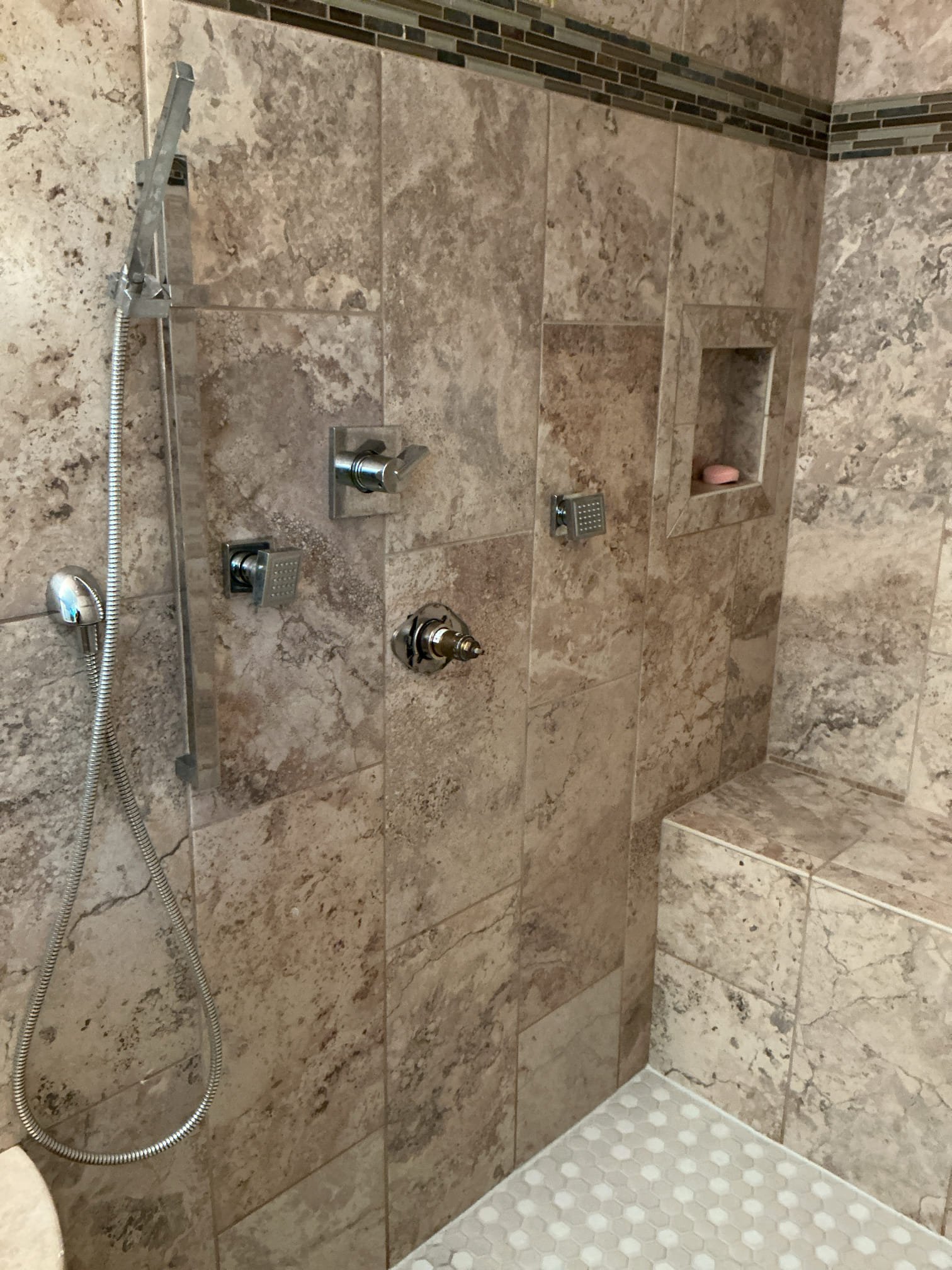 Returning to install customer provided shower cartridge we reviewed prior to this visit. Cartridge was stuck causing low pressure on hot side. After getting out old. Installed new cartridge, put shower back together, then checked for leaks and proper function. Went over work with customer for customer approval. Also flushed faucets to fix minor pressure issue at no cost. Left quotes for faucets. 