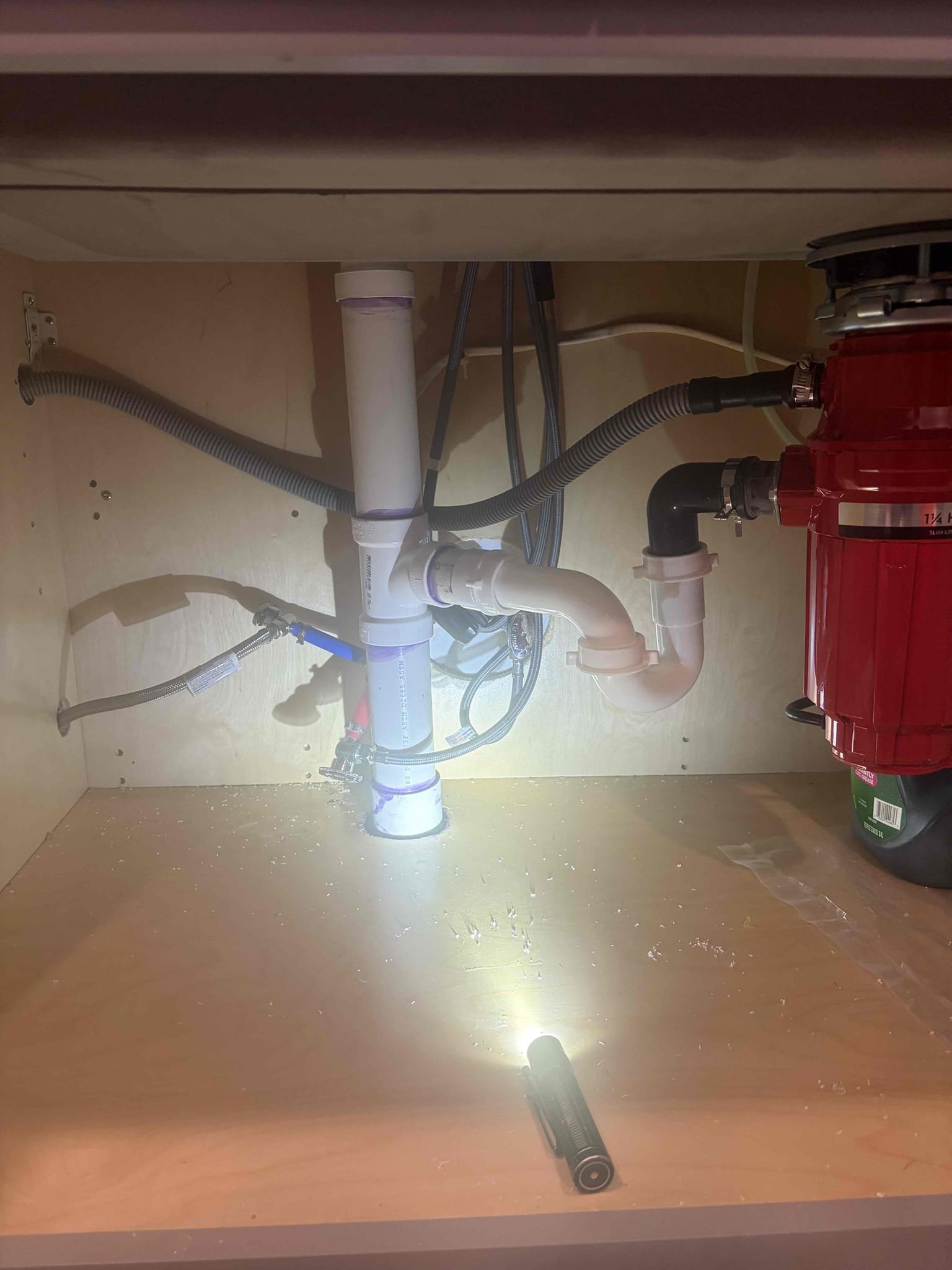 For this customer, we did their annual plumbing visit today and took a look at a few different things inside of the home. All of the supply lines in the house are all the poly supply lines recommended to swap them all out for braided steel supply lines. The customer wanted to add a water heater shut off valve for the cold side however, they were a little concerned that it wouldn’t turn off the water heater so we added a secondary shut off valve to the hot side to shut off valves on the water heater took a look underneath the sink in the kitchen of the basement and I had noticed that they had a tubular P-trap with a flex line going straight through the floor, which was no good because it also had tape covering it to secure to place so I recommended we do it the right way out of Studer vent following that at a T and plummet correctly in PVC with all glue joints in a new trap once we did all that properly there are no leaks. The customer is all set put a new discussion on the bottom of it