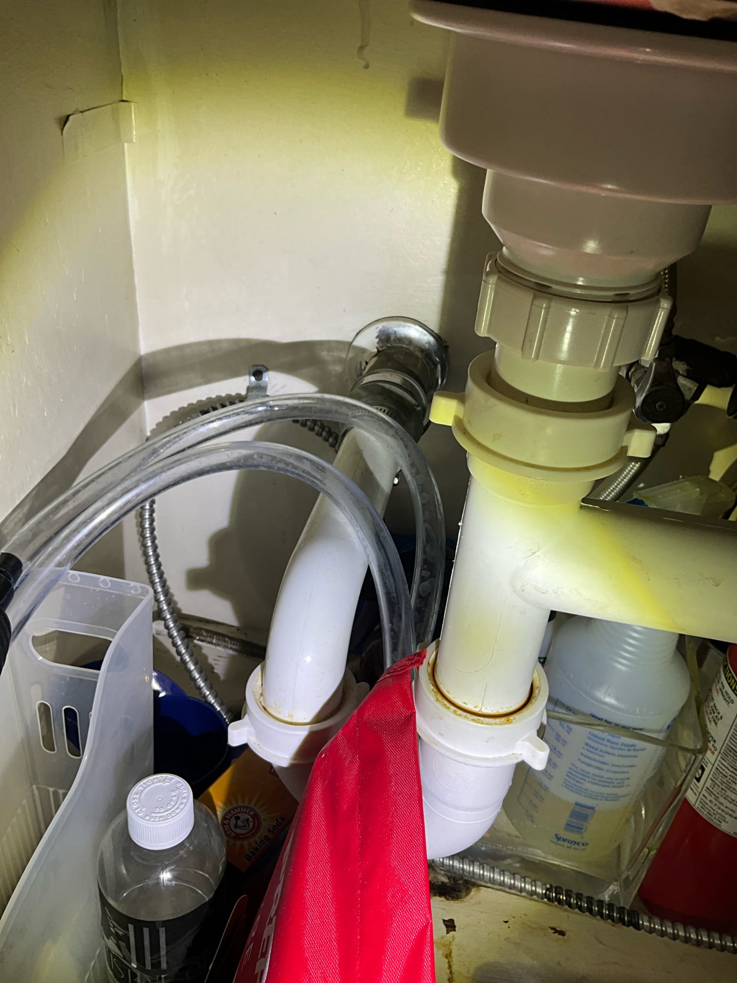 Customer had a kitchen sink backing up in both compartments. Informed customer that sneaking is risky due to agent condition of copper drain pipe discussed replacing pipe and wall with a new air admittance valve. Customer declined any work the required cutting the drywall. Customer approved, sneaking the drain and understood that it may not clear it and that it may damage the pipe cleared out rice and birthday cake from the line restored flow for now.