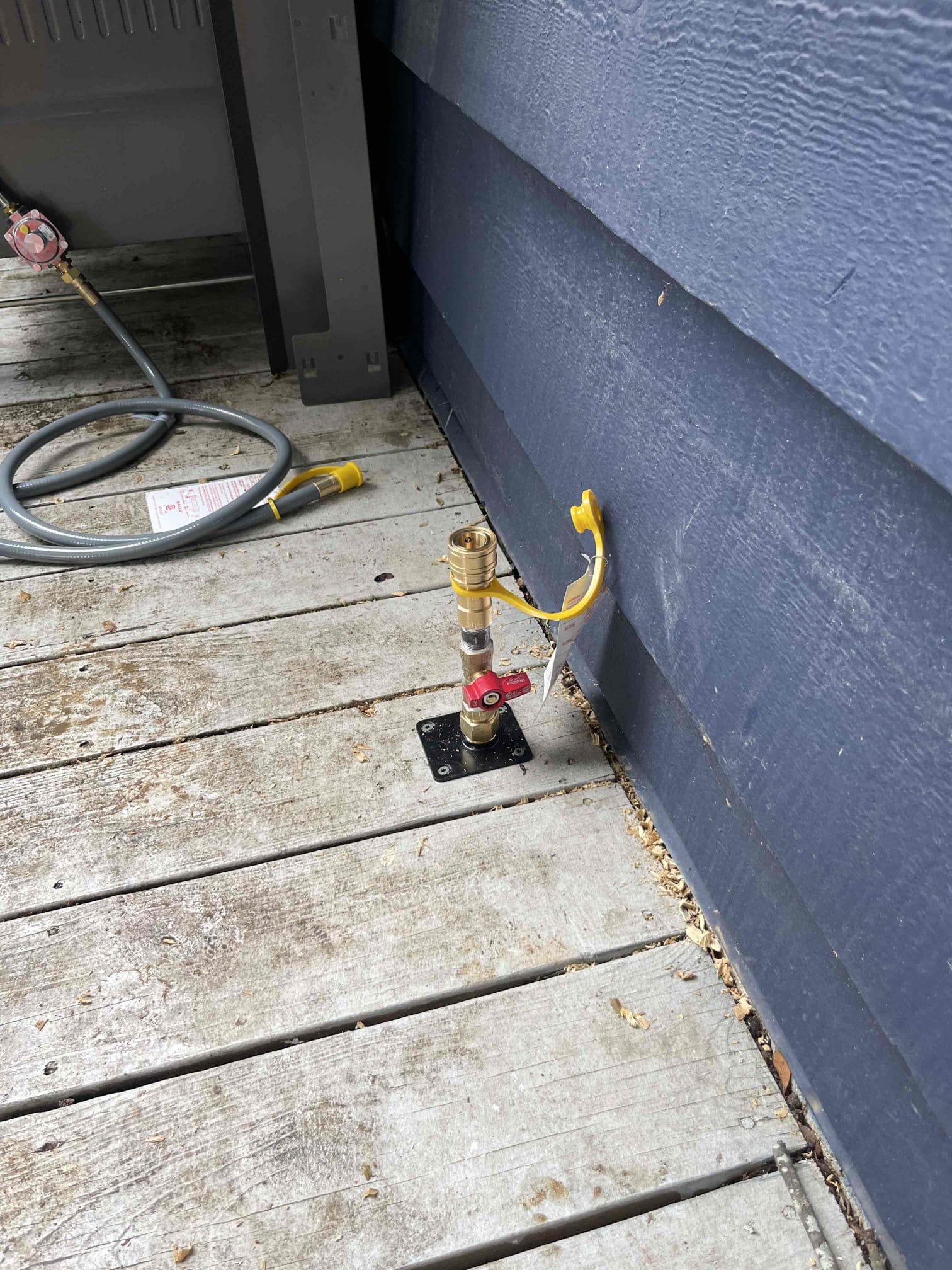 Came out to quote running a gasline for the grill. Customer already had an old gas line stubbed through the wall but it was turned off. We added a new isolation valve and ran trac pipe through the wall. Installed a new deck plate in the desired location coming up through the back deck. Pressure tested gas line for 15 minutes to confirm no drop in pressure. We also replaced the 10 year old water heater while we were here. Brought the installation up to code and tested to ensure a leak free installation and proper function. Left quote to replace the old water service. Customer will need county to locate the water meter before we can replace the water service. Service line will need to be sleeved as it is running through the septic tank/drain field. No further issue at this time. 