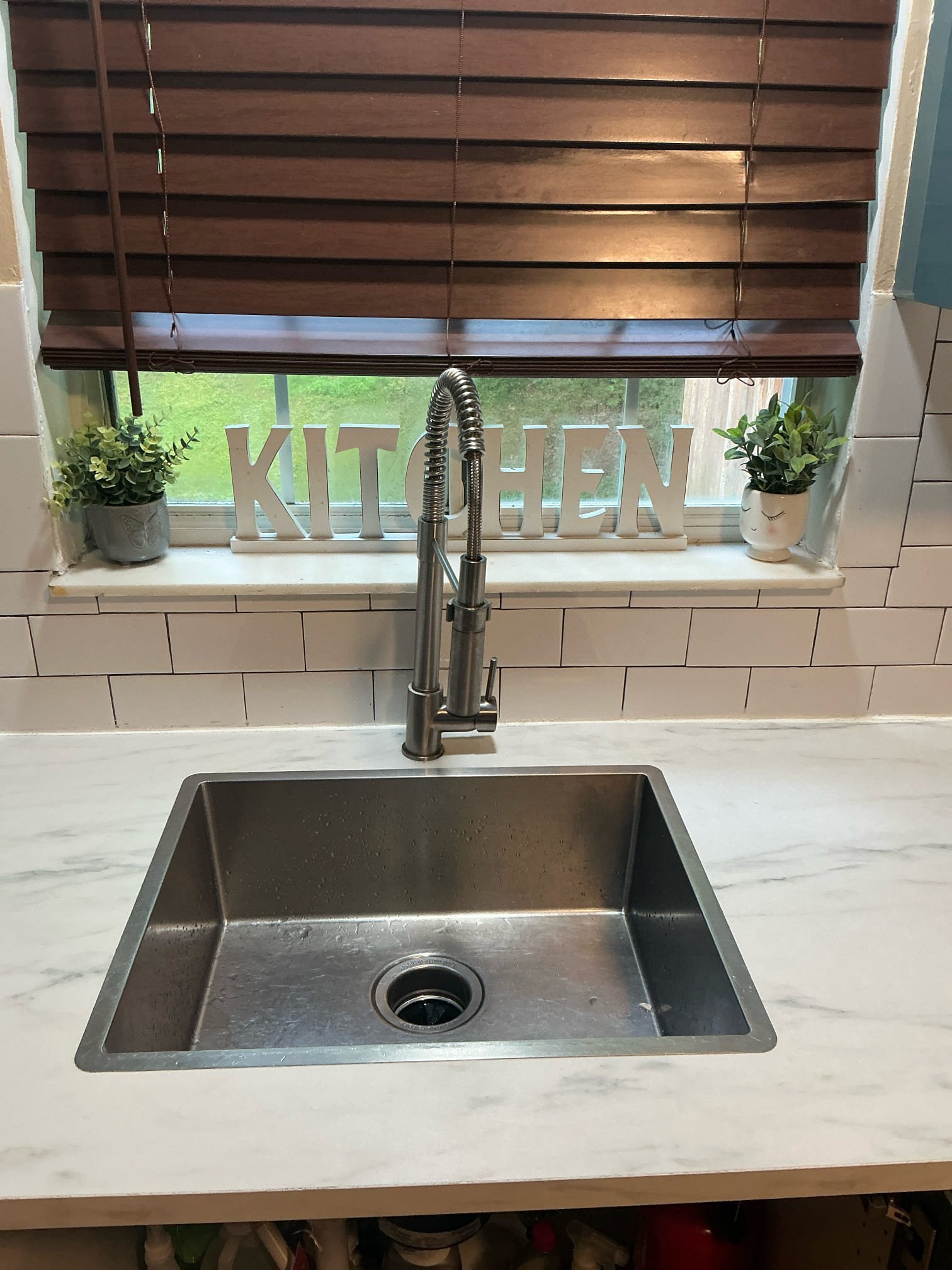 Found disposal jammed and kitchen faucet loose on arrival. Tighten kitchen faucet and Unjam disposal. No warranty on work. Tested and left in good working order. 