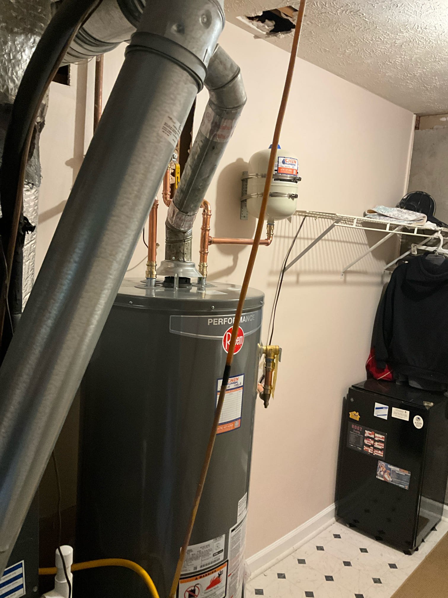 Customer had a 6 year old water heater that needed code upgrades and a new gas control valve. Quoted both repair and replacement options for the customer. Customer opted to replace. Installed a new Rheem water heater with a new pan, shutoff, and strapped thermal expansion tank. Checked all of my water and gas connections to ensure proper function and no leaks. None were found.