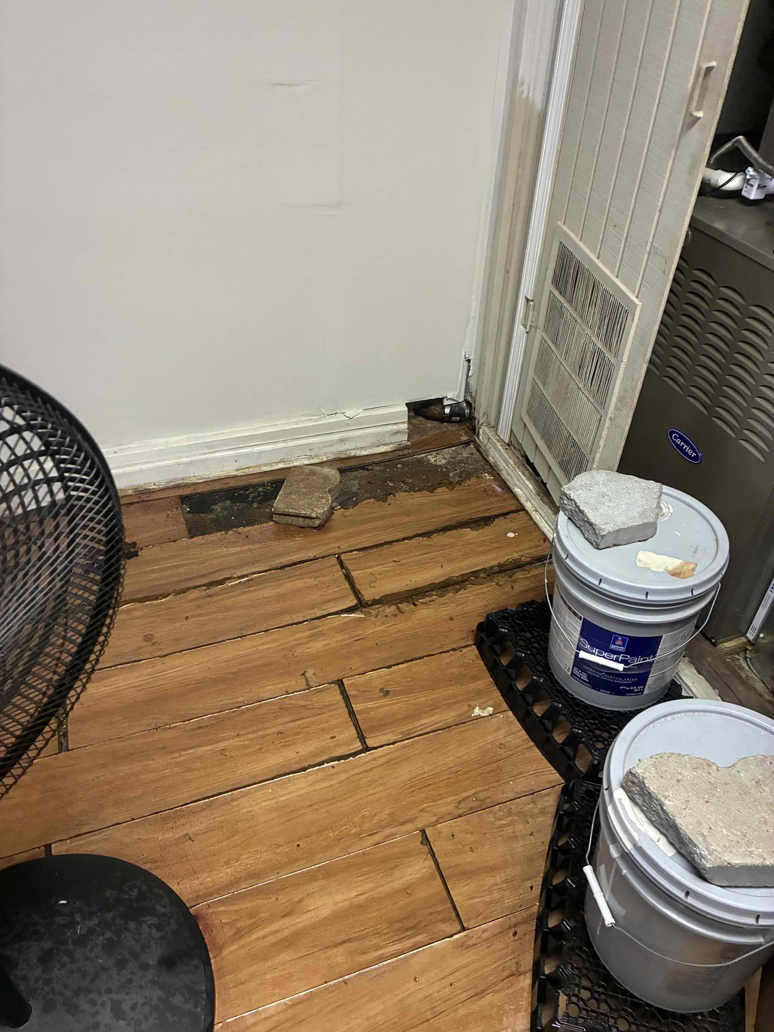 Customer stated water coming from toilet bowl and below toilet. When I arrived, no water was present. Ran water in order to attempt to re-create issue. Was unable to do so. Gave options for camera. Pulled toilet, ran camera all the way to manhole. Pulled manhole and found brick/rock debris. Removed debris and flushed system. Had to cut three-quarter old black iron pipe out from behind toilet in order to have toilet sit more properly. Explain to customer about conditions of toilet. Set toilet back and flush to check for leaks and proper function.