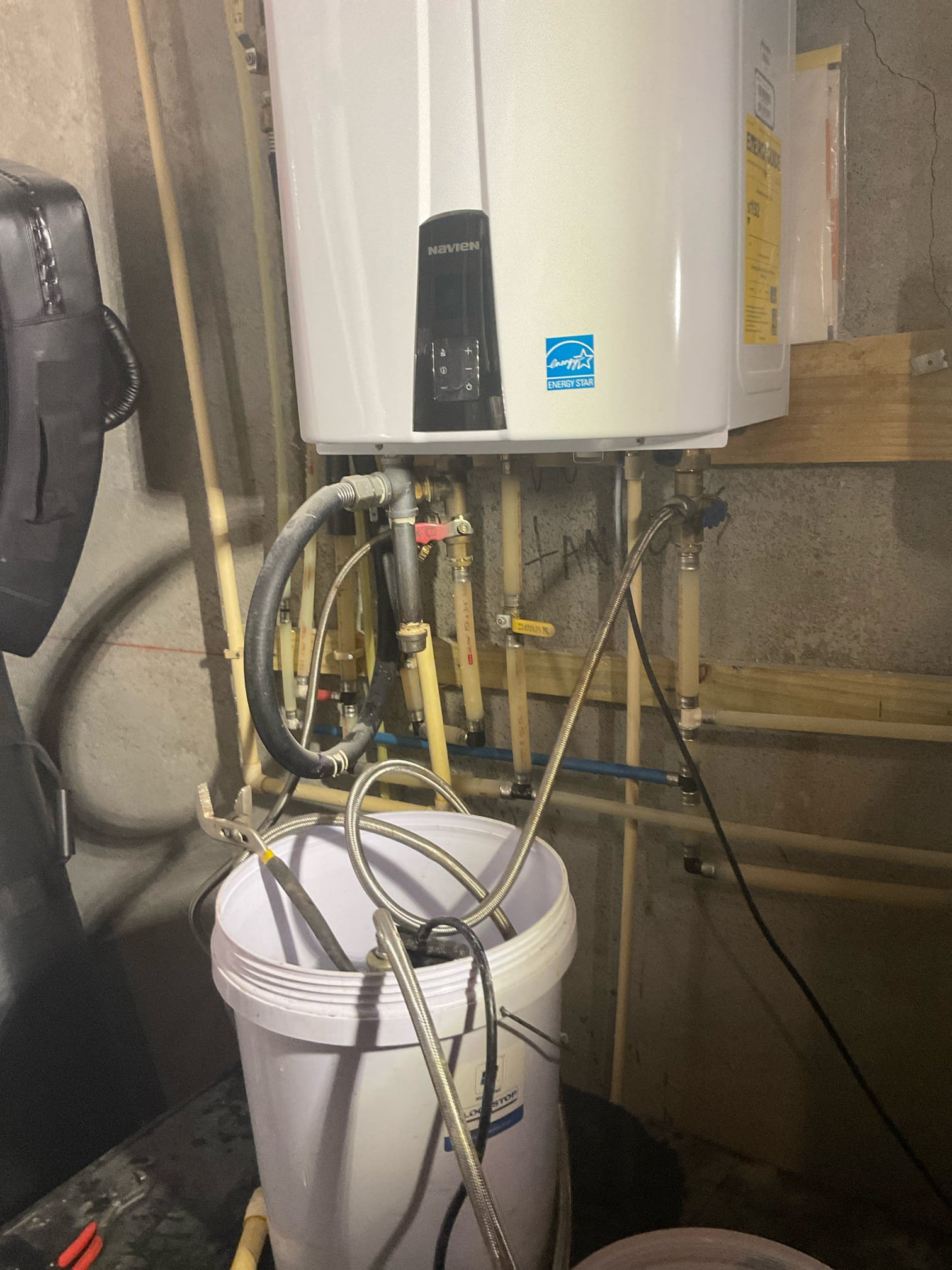 Tankless flush and some troubleshooting work with exhaust pipe pitch fix 