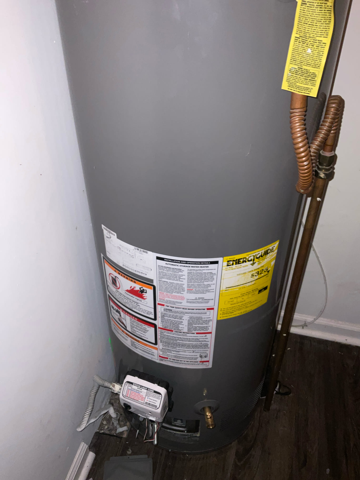Arrived for water heater installation inspection, we found many code violations and safety issues,
 1. Water heater exhaust flue pipe is not properly connected, that would cause carbon monoxide escaping. 
2. Water shut off valve is leaking and installer try to stop leak with some kind poxty type material 
3, gas connected with no sediment drip leg Flue pipe
4. No pan under the water heater 
5. Expansion tank is not in working condition 