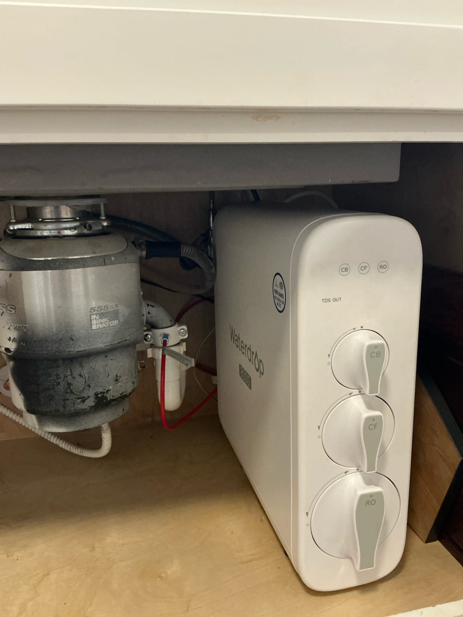 Installed customer supplied under sink reverse osmosis filter with customer supplied parts. Tested and left in good working order. Gave estimate to install additional ro system at basement kitchen sink. Customer waiting to get hole drilled through countertop.