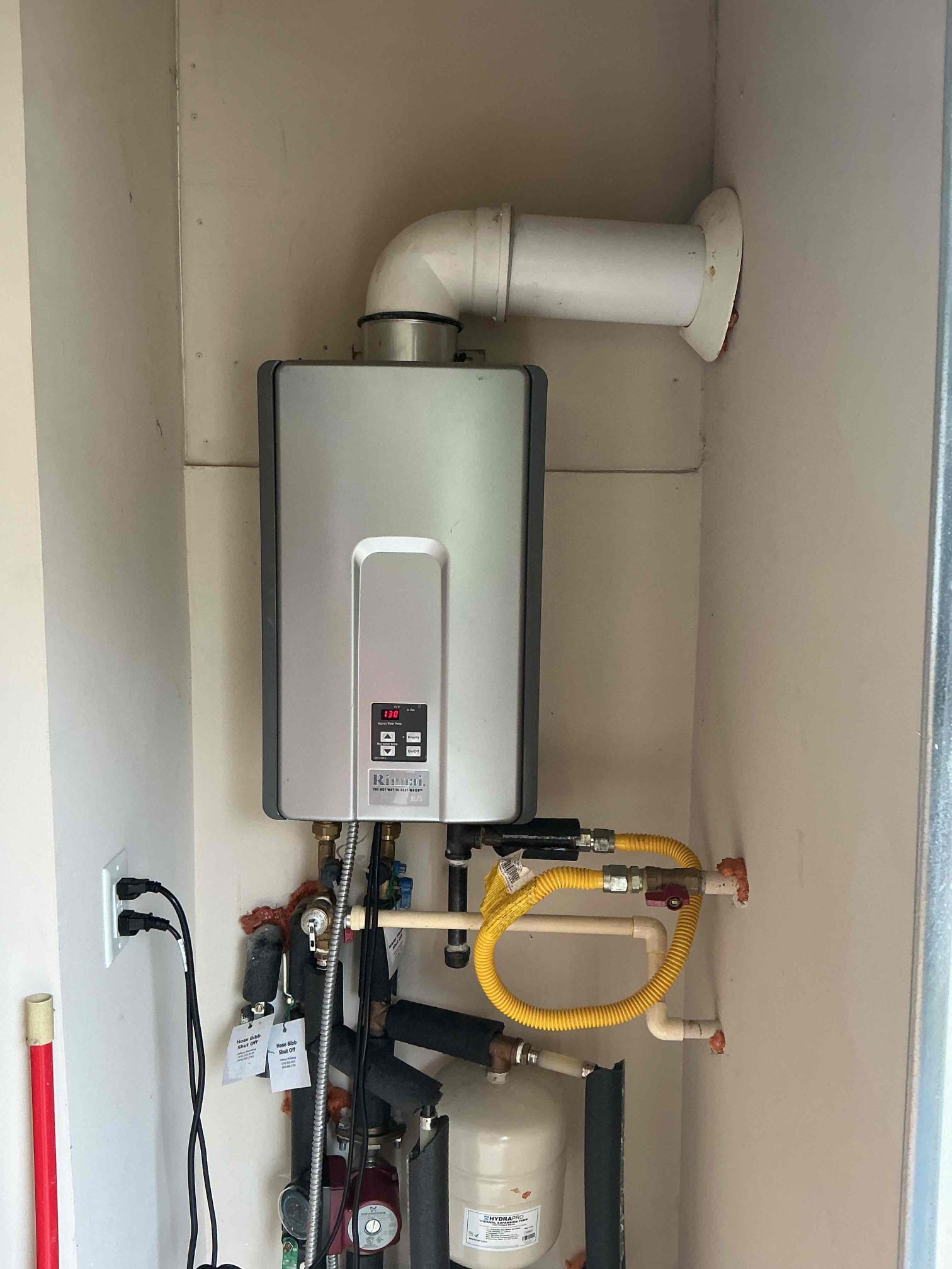 Customer has code 10 from RL 75 rinnai tankless water heater. Code was not present when I arrived offered plumbing inspection. Customer wanted to address heater first. Checked pressure found pressure to be good and suggested a few options for repair/replacement of heater. First flushed water heater as beginning process of repair. Began to run water after flush then code 10 appeared. Gave customer option for tier one repair on heater checked and cleaned igniters and removed exhaust fan and cleared debris from fan. Put fan back in place. Also cleaned incoming water filter . started unit by running water in multiple areas code did not appear. Explain to Customer about restriction of flow and potential issues going further with heater. We need to replace unit if issue continues.  