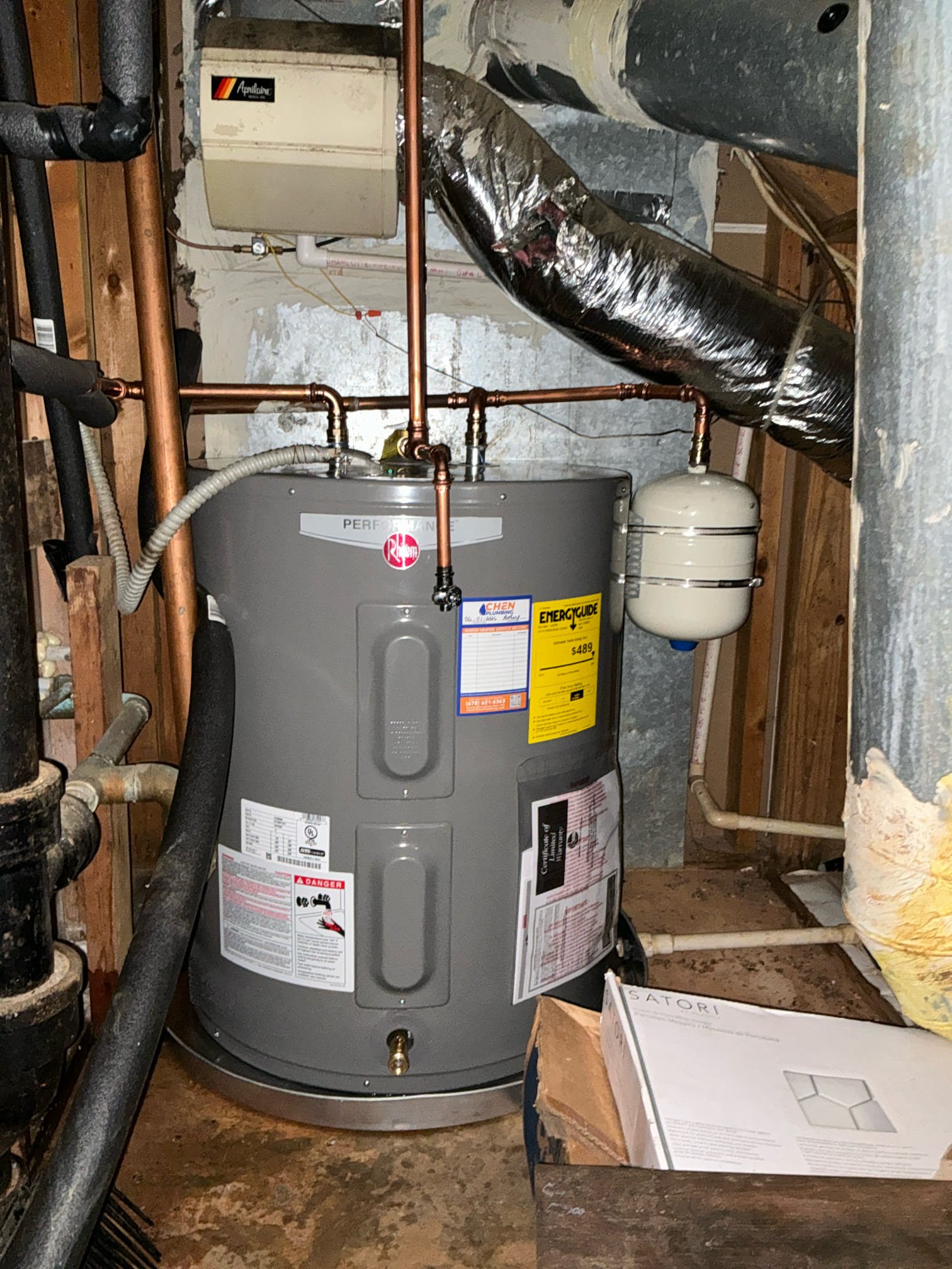 Found washing machine drain clogged and water heater leaking. Snaked washing machine drain to clear blockage. Filled and drain washing machine to test. Replaced water heater with new 47 gallon electric low boy. Filled and tested water heater. Left everything in good working order.