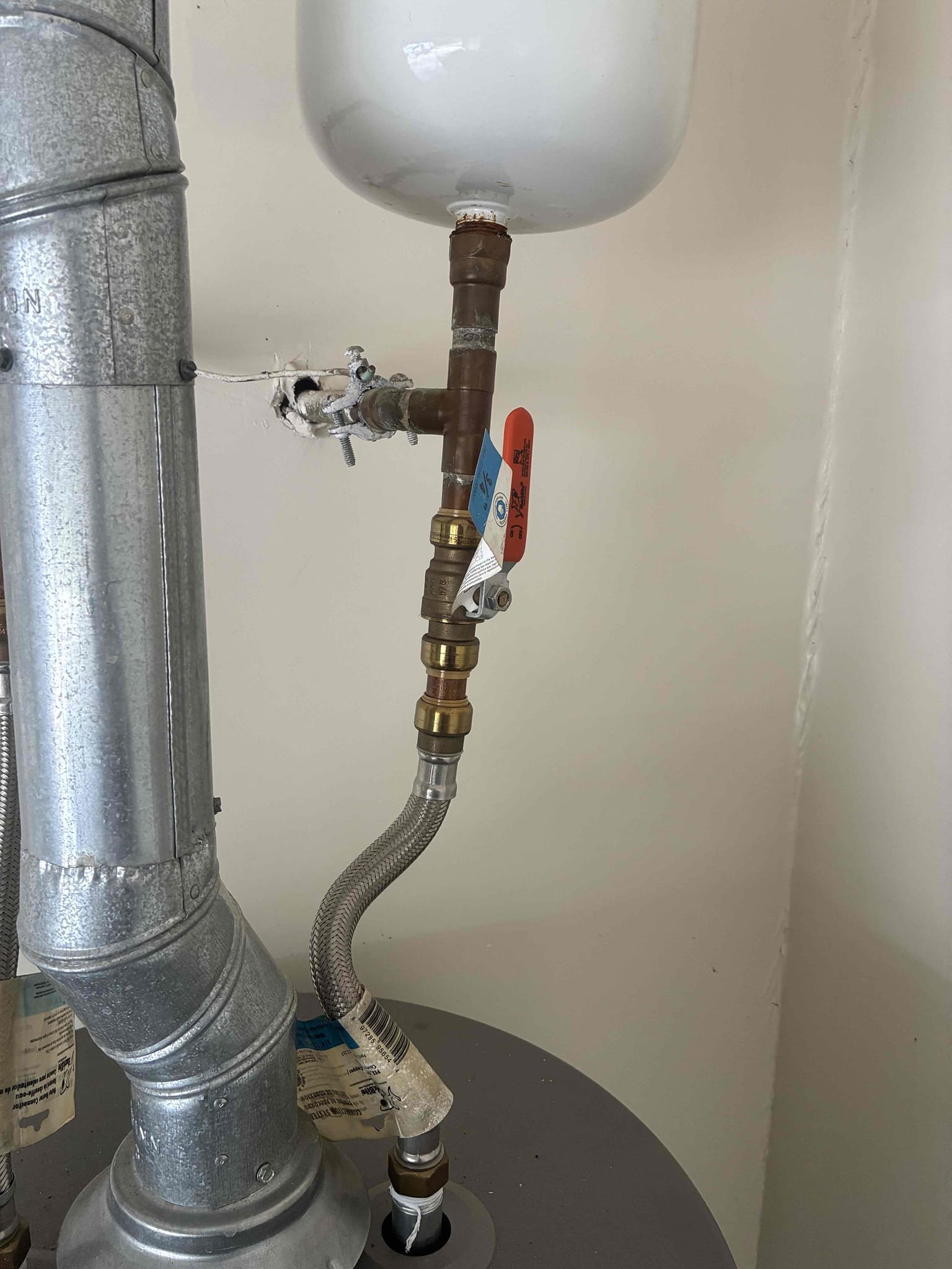 Customer has issue with toilet, not shutting off. After thorough evaluation, found pressure to be good in a few other issues I addressed with Customer at water heater gave Customer options for repair/replacement of these items picked up Kohler toilet to replace old toilet. flange was in good condition. Also remove steel braided hose and replaced thermal expansion tank with bracket. Reorganized piping so shut off is in front of thermal expansion tank. New shut off was courtesy item. After work was complete check for leaks and proper function of all work.