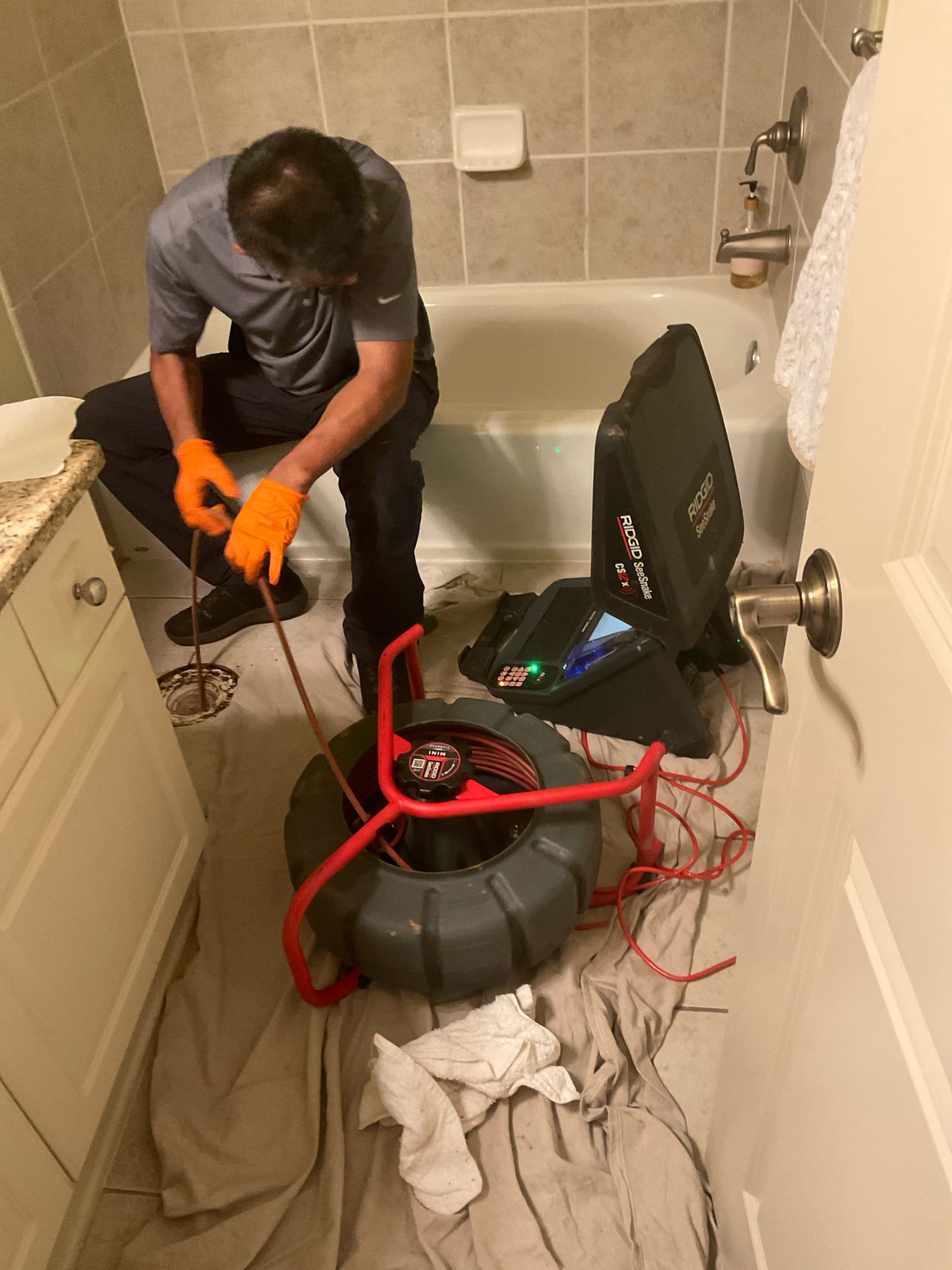 Pull and reset toilet , cleared blockage , after camera inspection found major belly in the line need replacement and make better slope . 