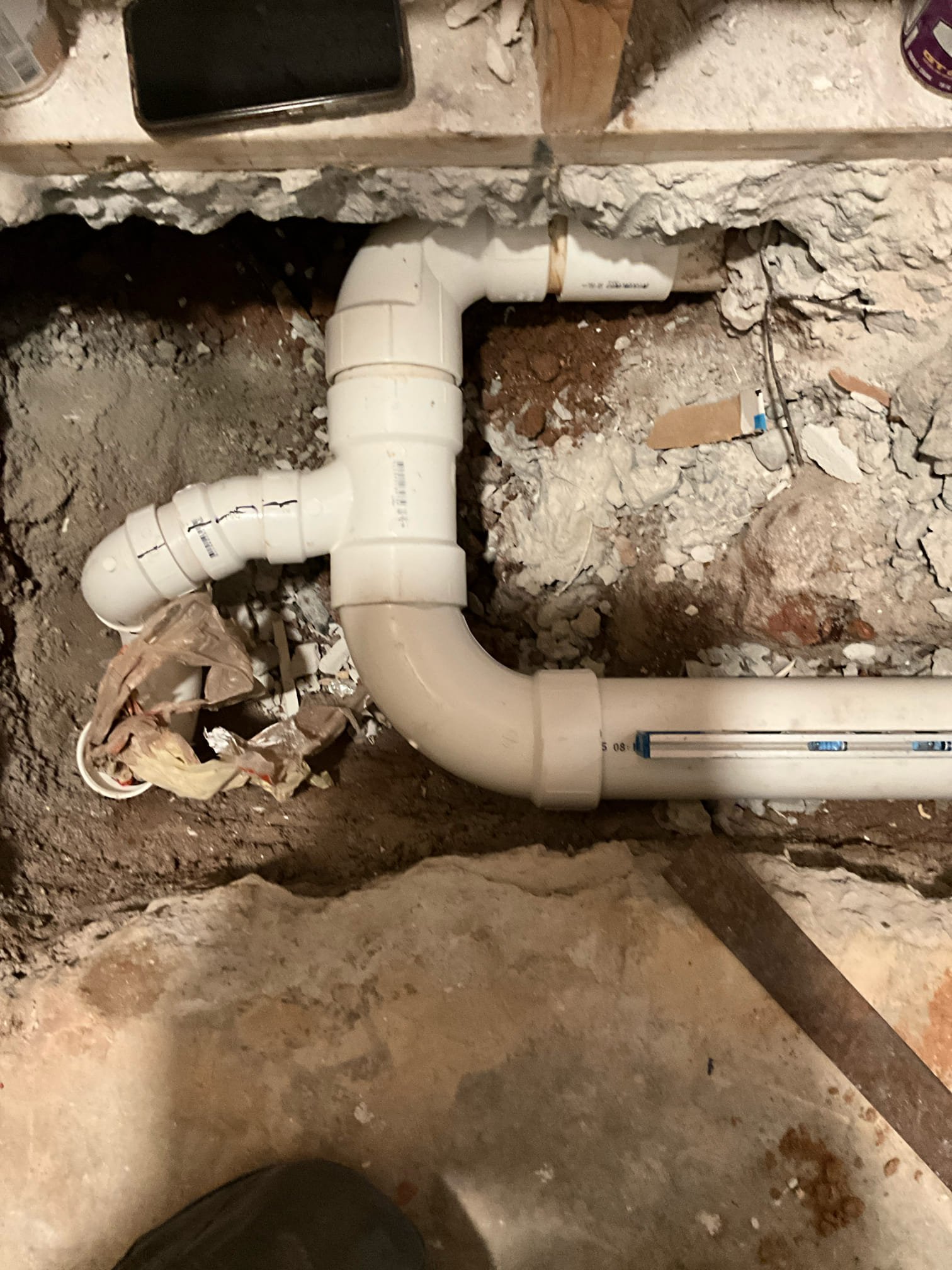 Return to complete quoted work.

Repaired exposed slab leak in main level bathroom. Poured concrete after reattaching drainline. Attached shower drain and toilet flange. 

Installed and moved prv and shut off valve. When attempting to relight water heater we found that the gas service has not been connected yet.

Installed two customer supplied faucets, and corrected p traps in Jack and Jill bathroom. 

Connected pex to tub faucet in master bathroom. Reapplied putty to tub drain.