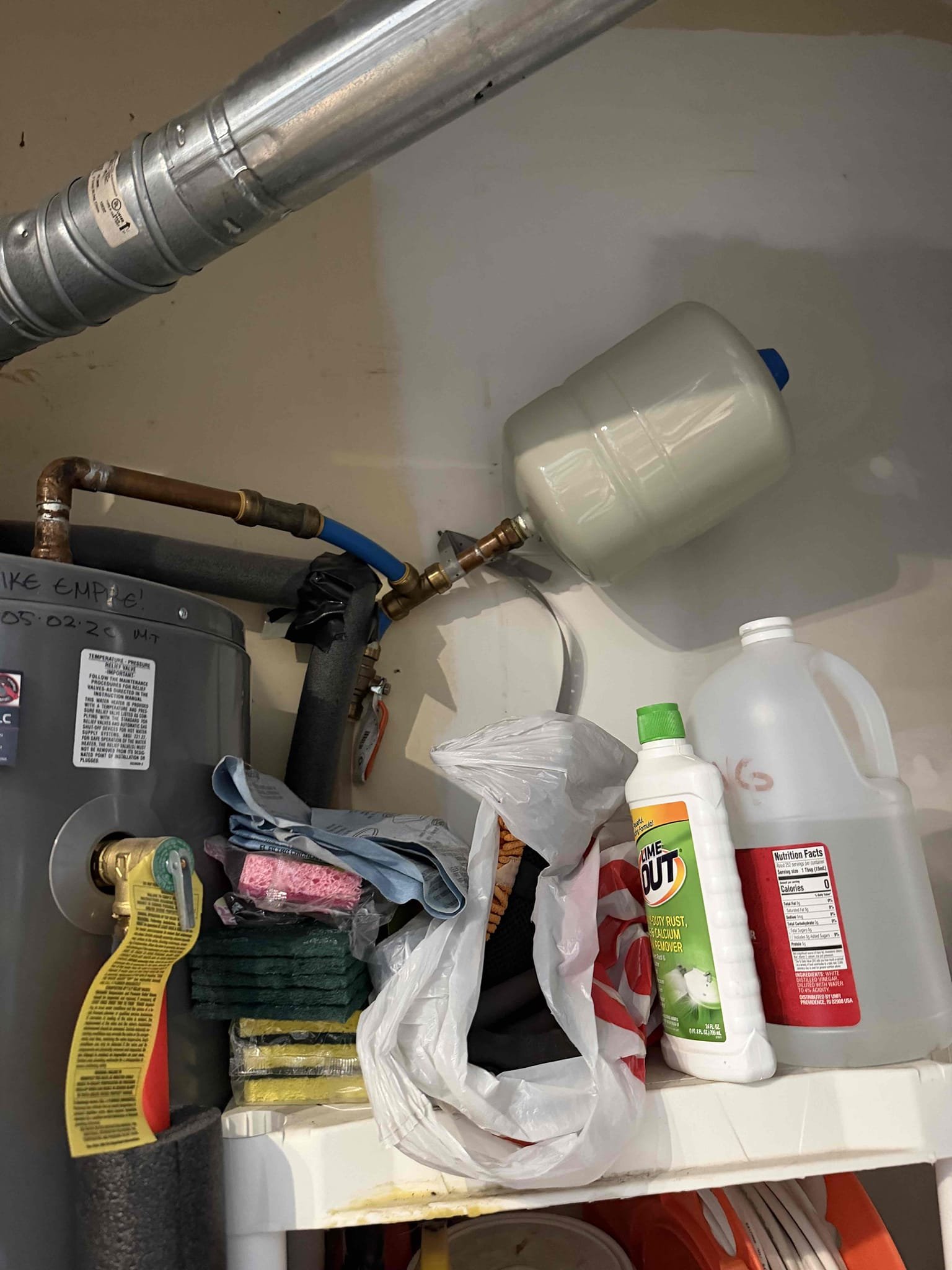 Was called out for leak upstairs bathroom and smell of gas around water heater. When I arrived homeowner showed me the spot from to leak in ceiling of bedroom downstairs. When I started locating where leak could be coming I noticed shower head was broken and spraying wall and running down to the trim kit and tub spout that had a gap and was running behind the wall. Also tested water pressure and was at 130 which caused the expansion tank to become water logged.Replaced PRV(set to 60 psi)and main water shut off. Replumbed in expansion tank. Replaced showers head and caulked trim kit and spout. Checked work and cleaned up work area