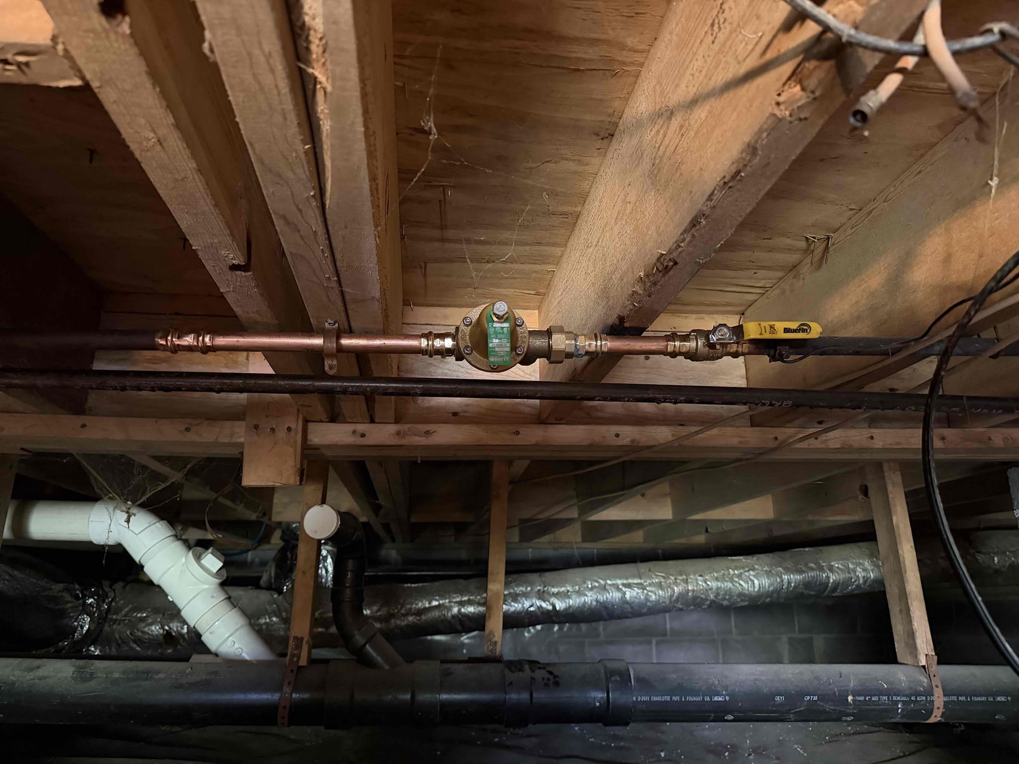 Was called out for leak upstairs bathroom and smell of gas around water heater. When I arrived homeowner showed me the spot from to leak in ceiling of bedroom downstairs. When I started locating where leak could be coming I noticed shower head was broken and spraying wall and running down to the trim kit and tub spout that had a gap and was running behind the wall. Also tested water pressure and was at 130 which caused the expansion tank to become water logged.Replaced PRV(set to 60 psi)and main water shut off. Replumbed in expansion tank. Replaced showers head and caulked trim kit and spout. Checked work and cleaned up work area