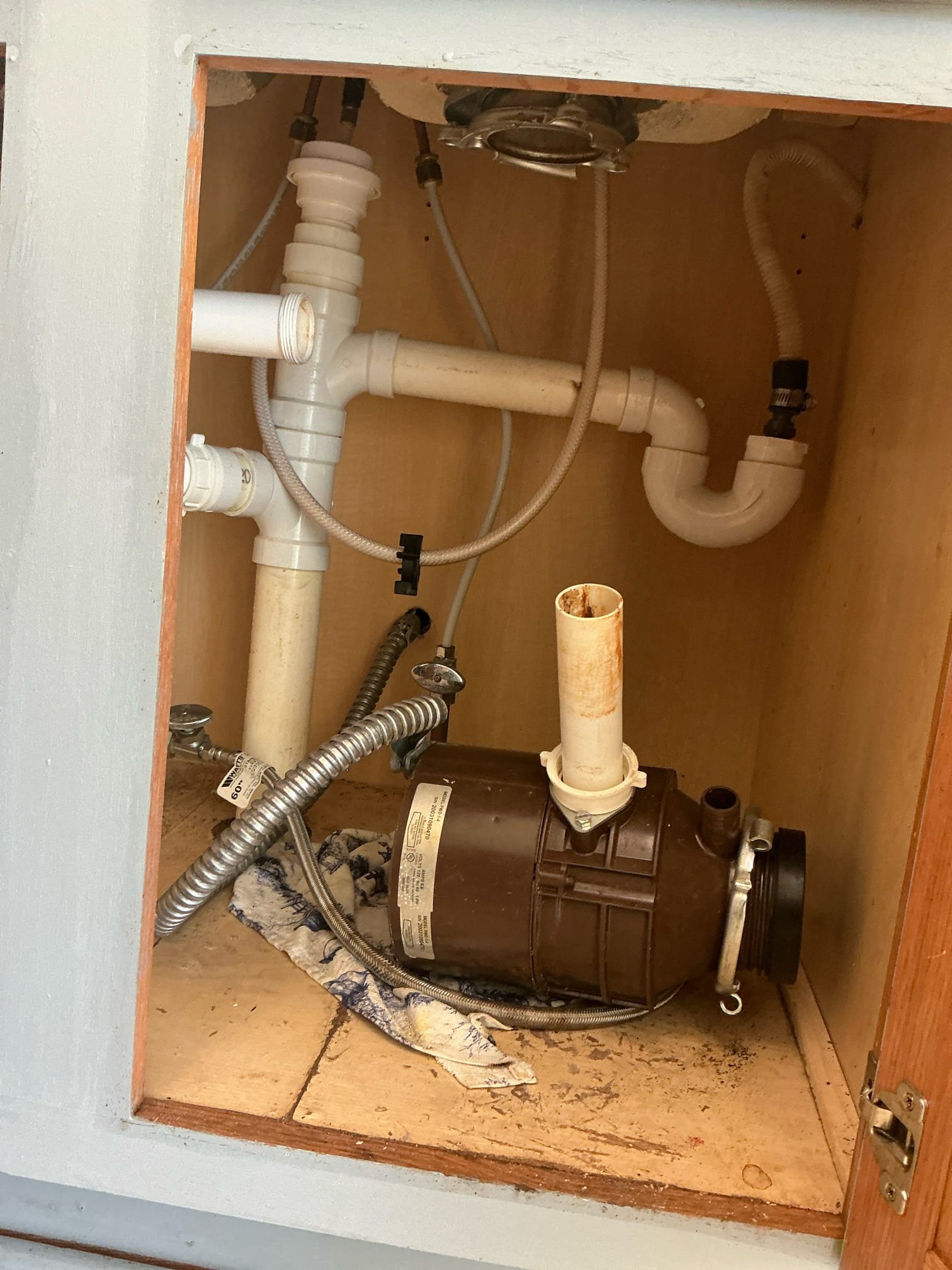 Disposal was removed from sink on arrival. Installed new customer supplied disposal on right side of kitchen sink. Tested and left in good working order.