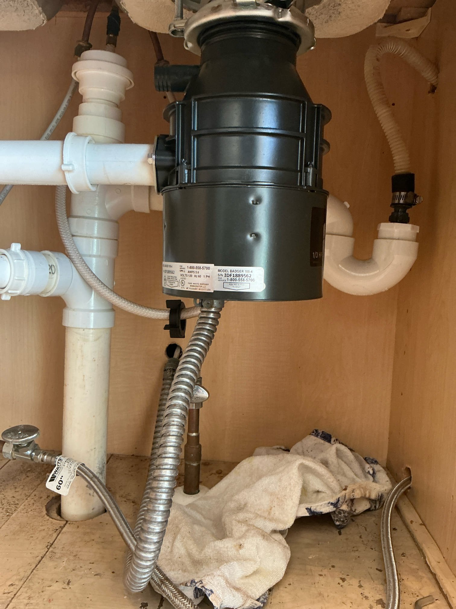 Disposal was removed from sink on arrival. Installed new customer supplied disposal on right side of kitchen sink. Tested and left in good working order.