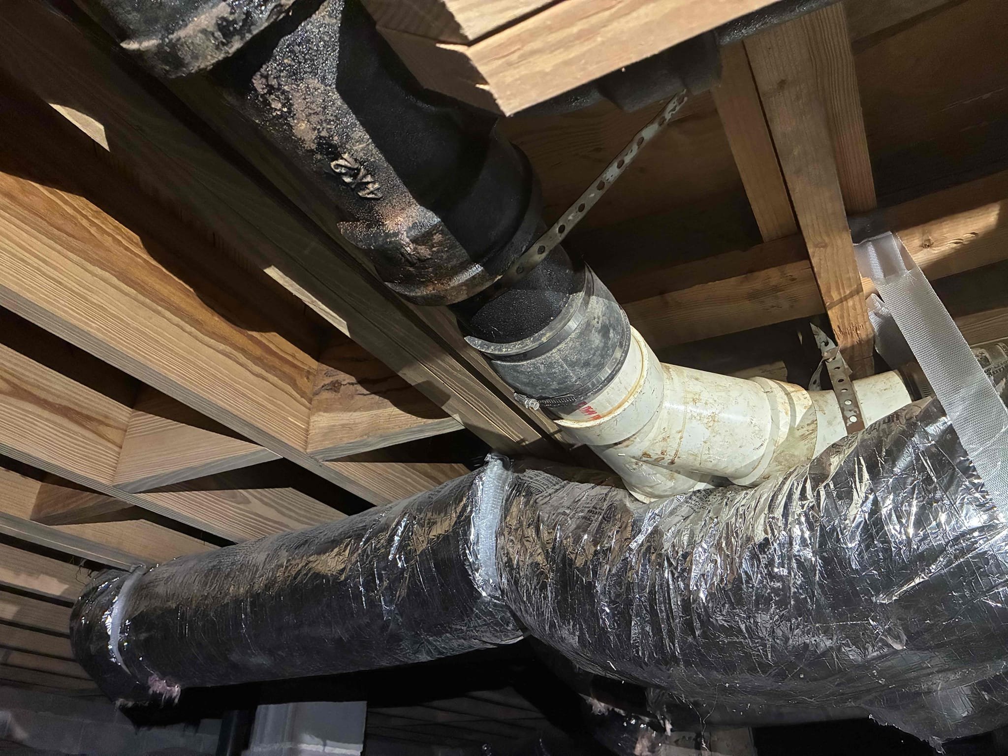 Customer originally called us out for what appeared to be a sewer smell in the crawlspace, after an initial evaluation, we found sewer line to be leaking into crawlspace, pooling  underneath area where pipe is cracked, gave option to repair section of pipe customer approved, cut out about 10 feet of damaged cast-iron pipe and replaced with new PVC. Made sure to properly Support and use approve fittings thoroughly tested all work.
