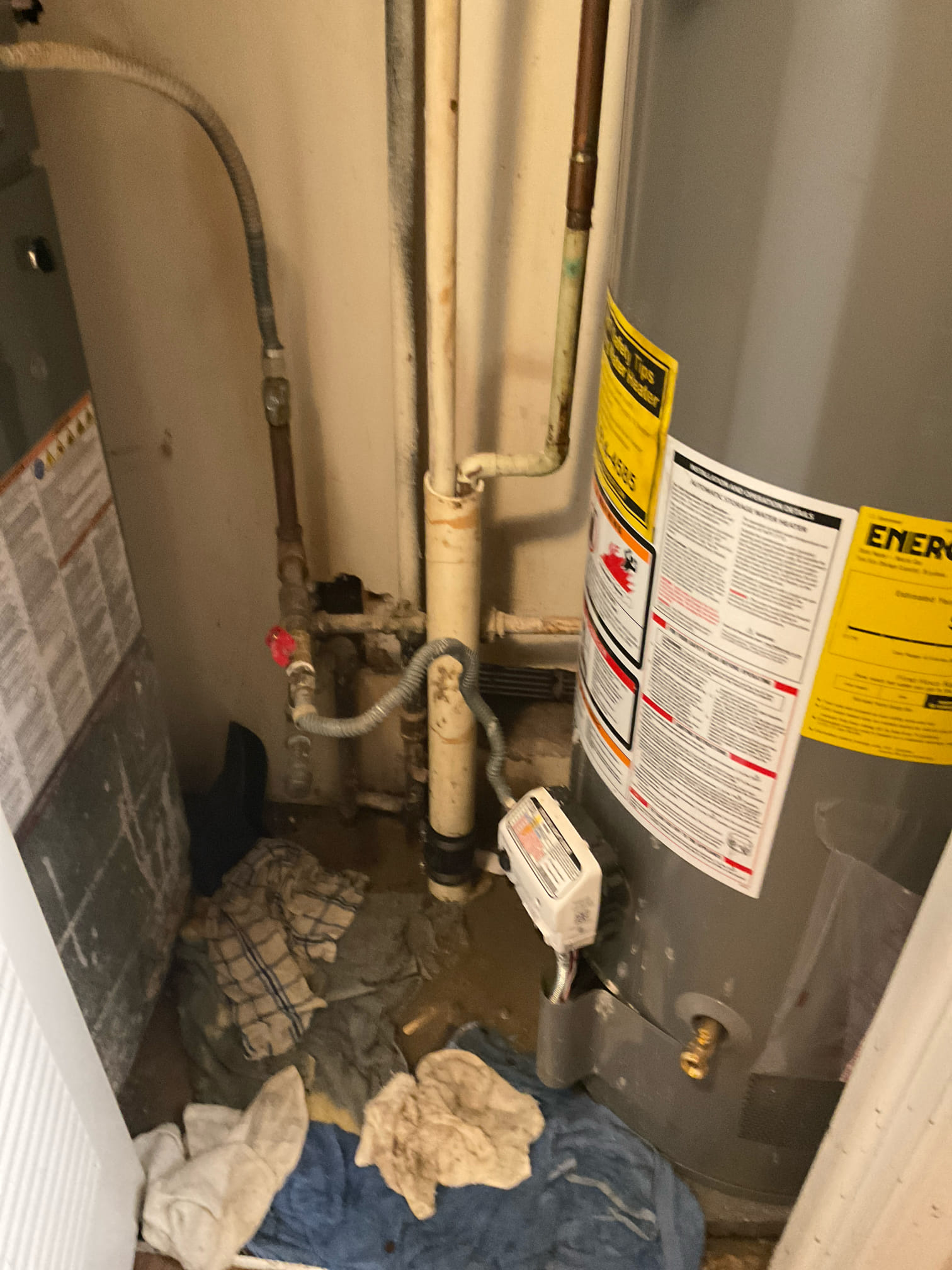 Cleared 2” pvc drain catch water heater t p line and hvac condensate for two units , snaked 25 feet to cleared . 