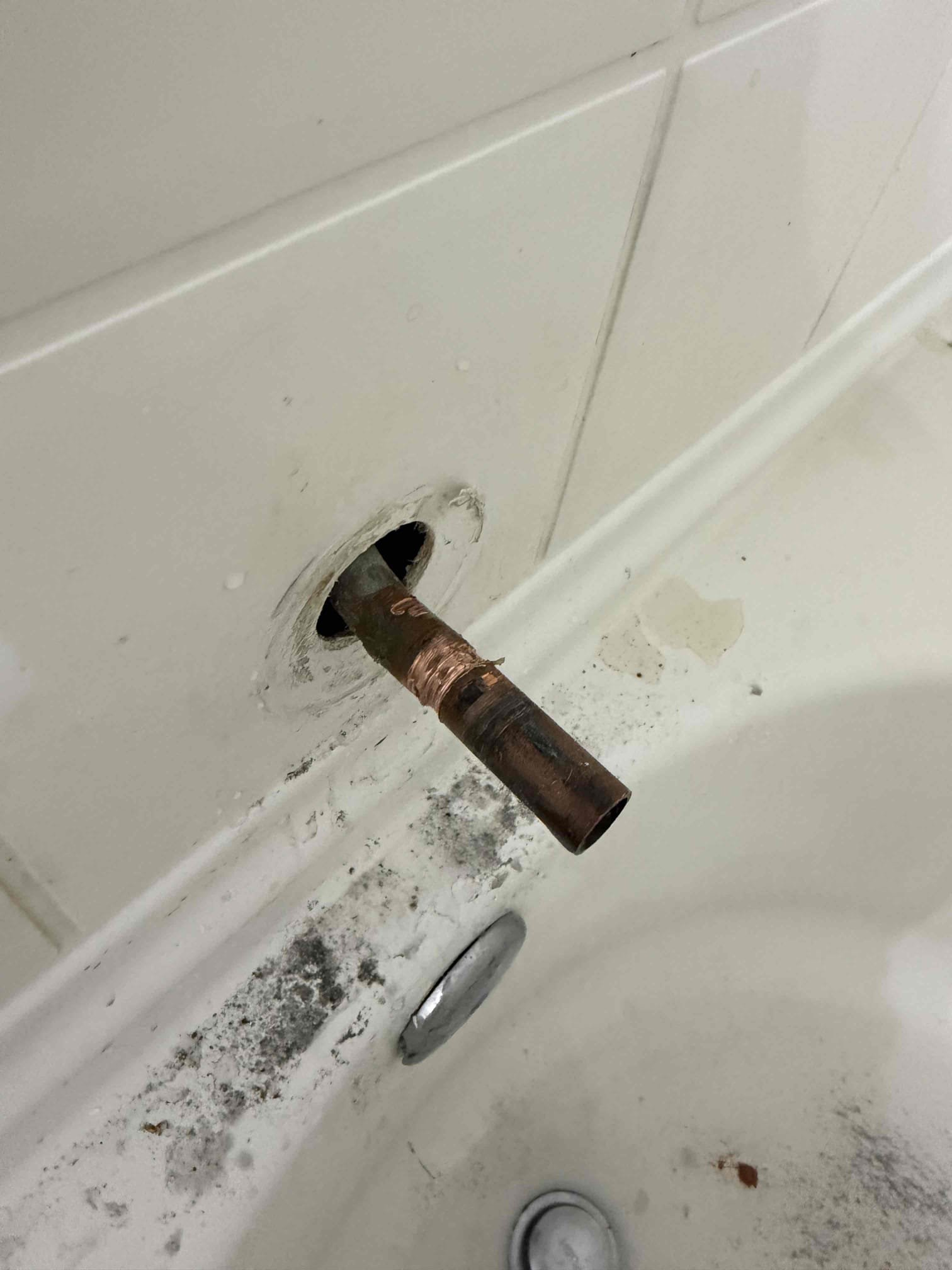 Customer stated that tub spout wasn’t working properly and they attempted to replace it but couldn’t get it replaced. Stated to customer that will need to remove old tub, spout, and install new one and customer agreed. Went ahead and removed old tub, spout, and found that pipe was damaged. Stated to customer that pipe will need to be repair repaired. When I had an installed new piping for tub, spout, and install installed customer supplied tub spout. Tested work and now tub spout is working as it should and no leaks present at this time. Caulked around tub, spout, and cleaned up work area. Also installed access panel.

Also found that water heater was leaking and recommended to customer to have water heater replaced, but at this time customer didn’t want to proceed with replacing water heater. Will send estimate for water heater replacement