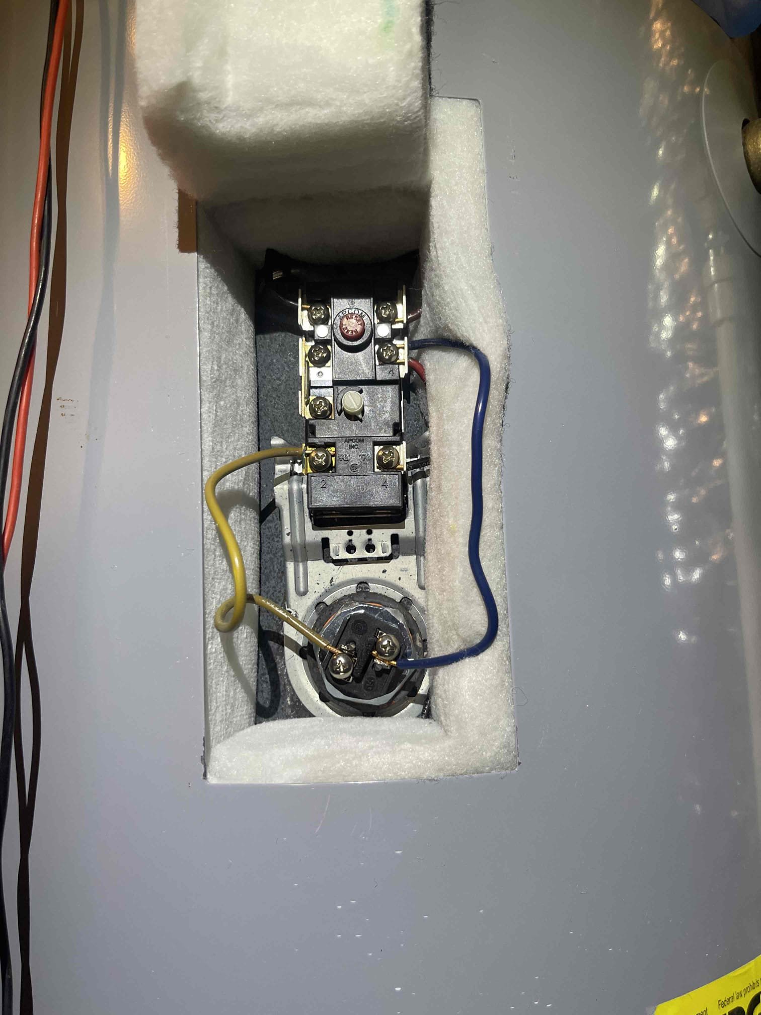 Came out for no hot water. We arrived and found customer had two electric AO smith water heaters with an MFG of 2020. Upon initial inspection, left tank piping was warm to the touch, but the right tank was cold. Tanks were piped in in parallel with a recirc pump. Received approval to do electric water heater diagnostic. We checked the breaker and found neither were tripped. Checked the incoming power to the tank and found it was getting power, and the reset button was tripped. We disconnected the leads and checked both the upper and lower element, finding normal continuity reading on both. Both thermostats tested normally. No sign of and scorching or bad wiring. Hit the reset button and found the water heater started working normally again. We instructed homeowner how to isolate water to the tank if the issue reoccurs so she still has hot water until we can come back out. She has only lived in the home for a few months and is not familiar with the history on the tanks. We recommended h
