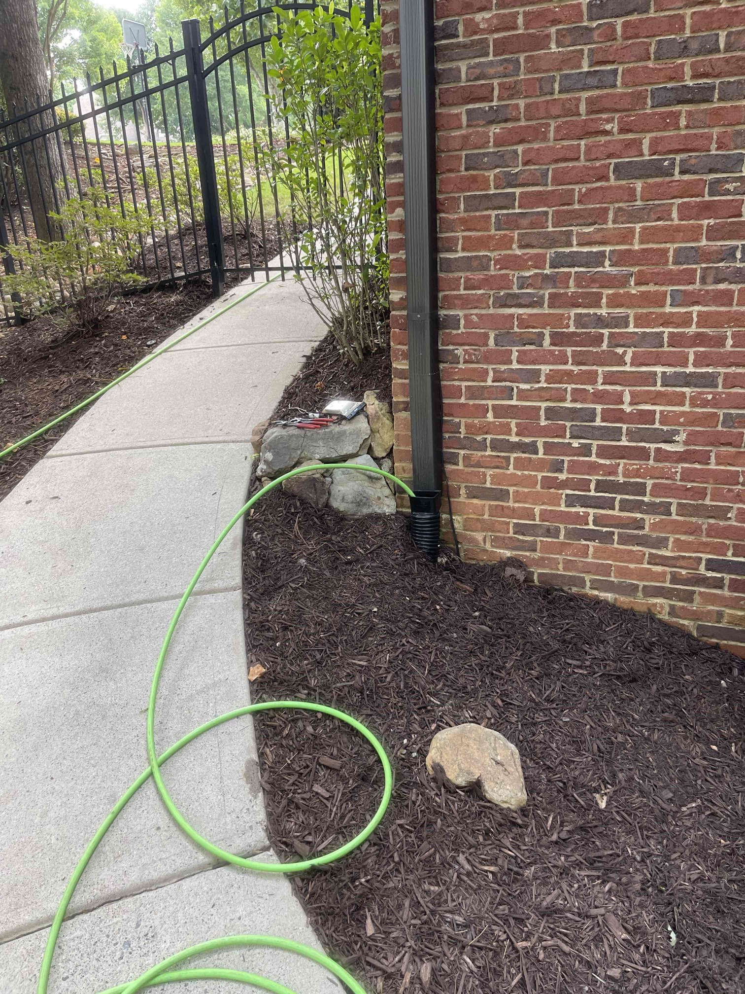Customer had a catch basin in the front yard and multiple downspouts that were not draining correctly during heavy rainfall. We disconnected the pipes from the downspouts and jetted the, out. Jetted out the catch basin. Verified adequate flow discharging from the end of the pipe in the back yard. No further issue at this time. 