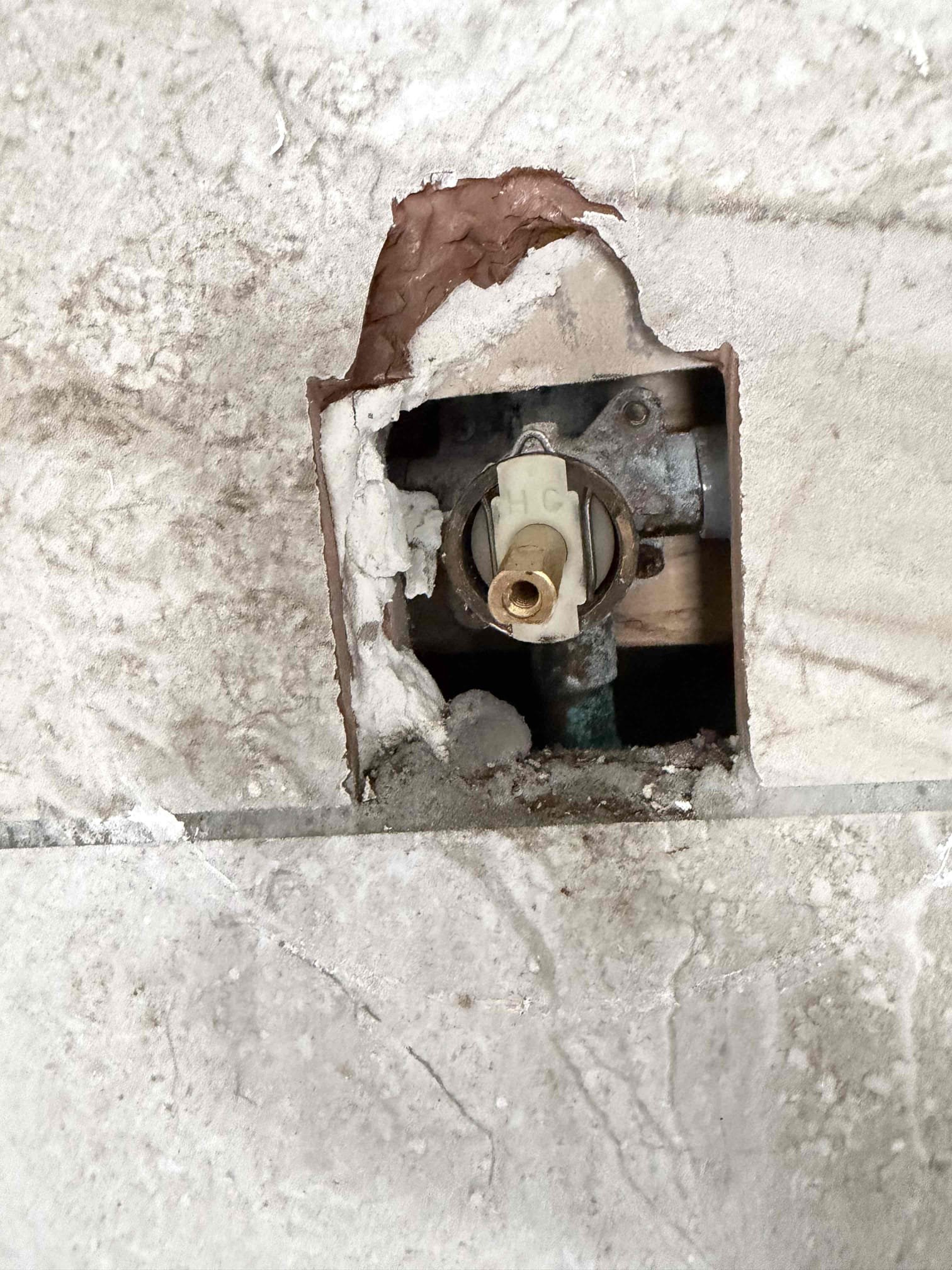 Called out for dripping shower. While removing the old moen cartridge the the back of it was broken where it sits on the back of the valve(see pictures). Replaced cartridge. Checked work and cleaned up work area